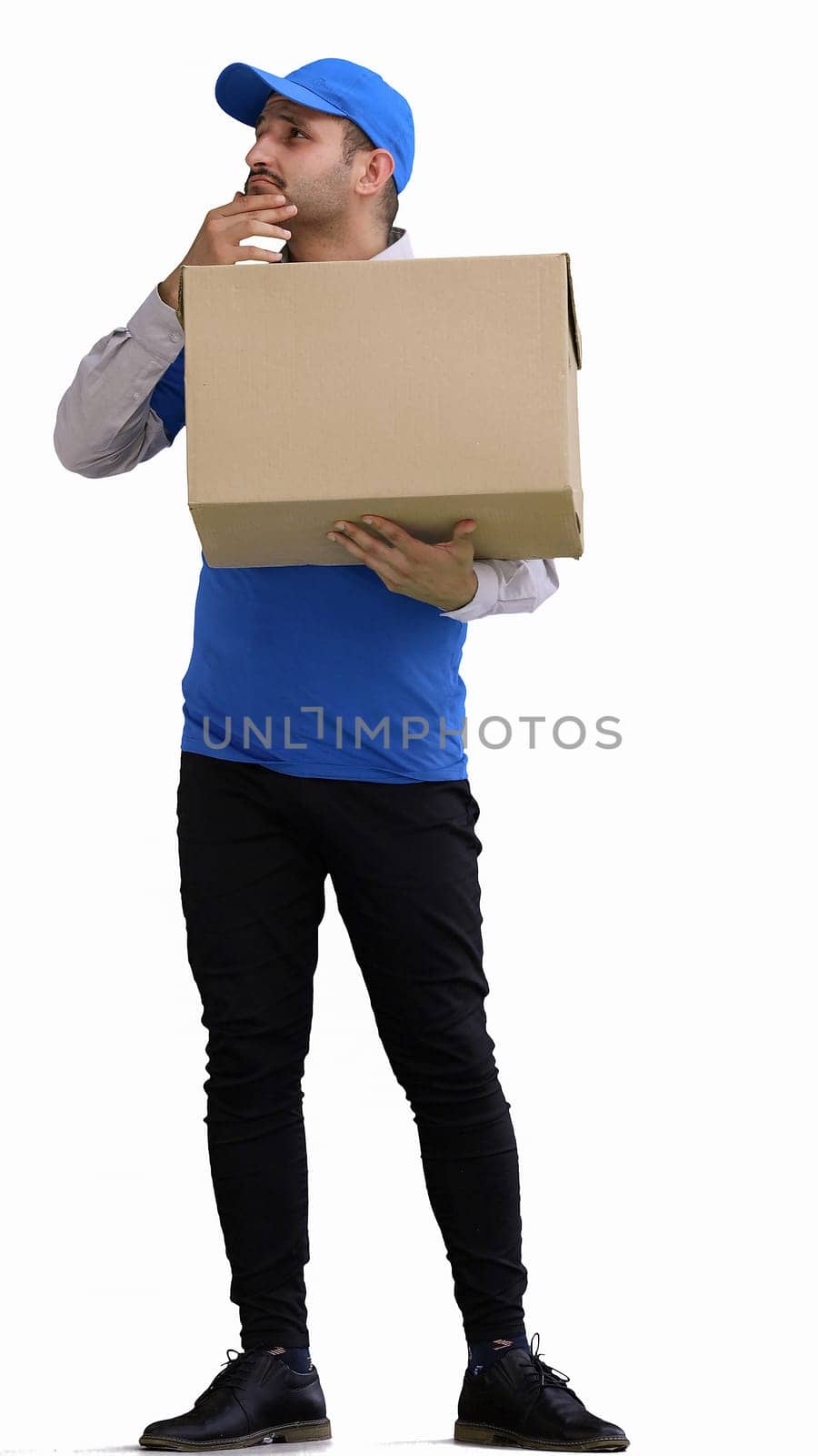 full-length male courier holding a box on a green background by Prosto