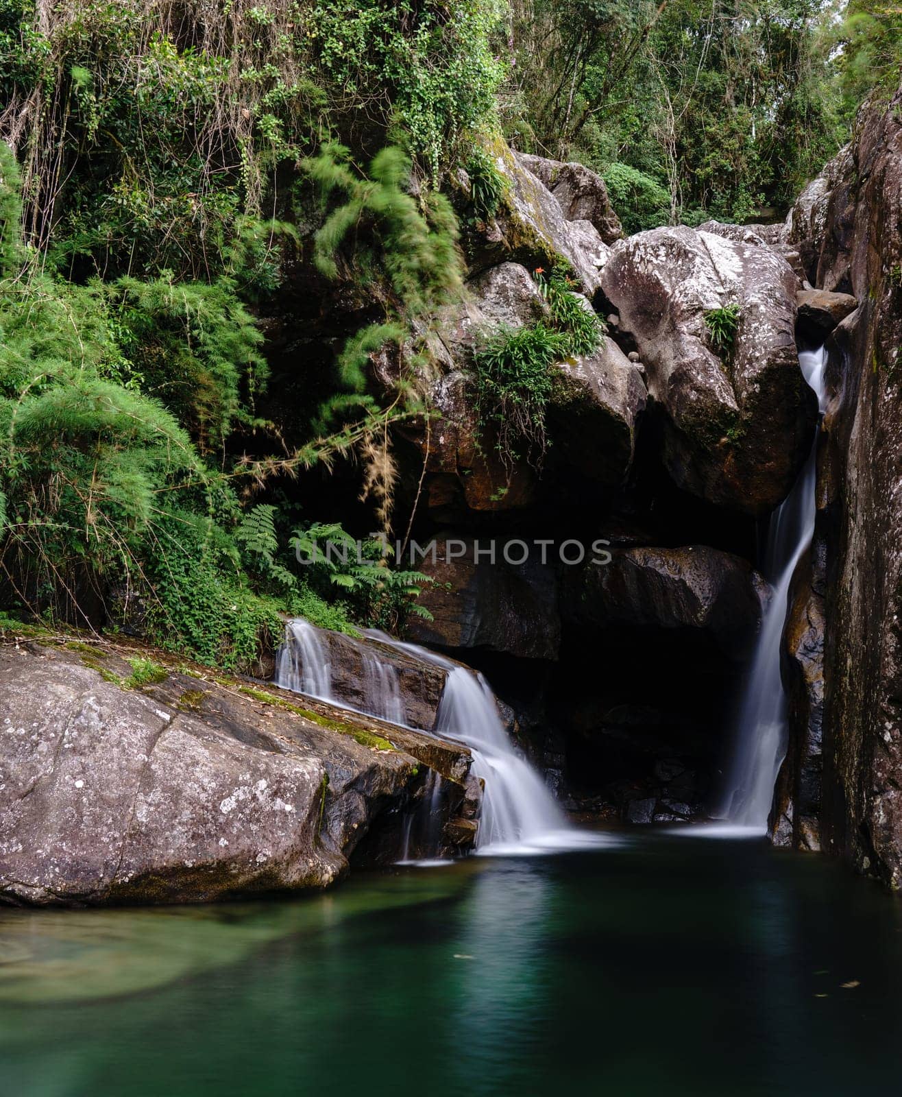 Beautiful Tropical Waterfall in the Heart of the Rainforest by FerradalFCG