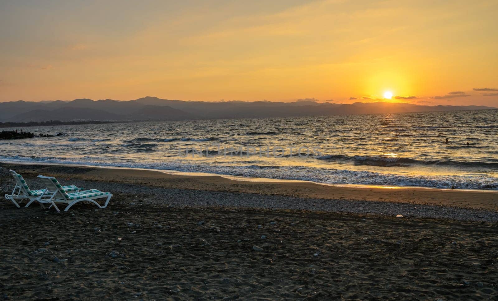 sunbeds in the sea on a Mediterranean beach 1