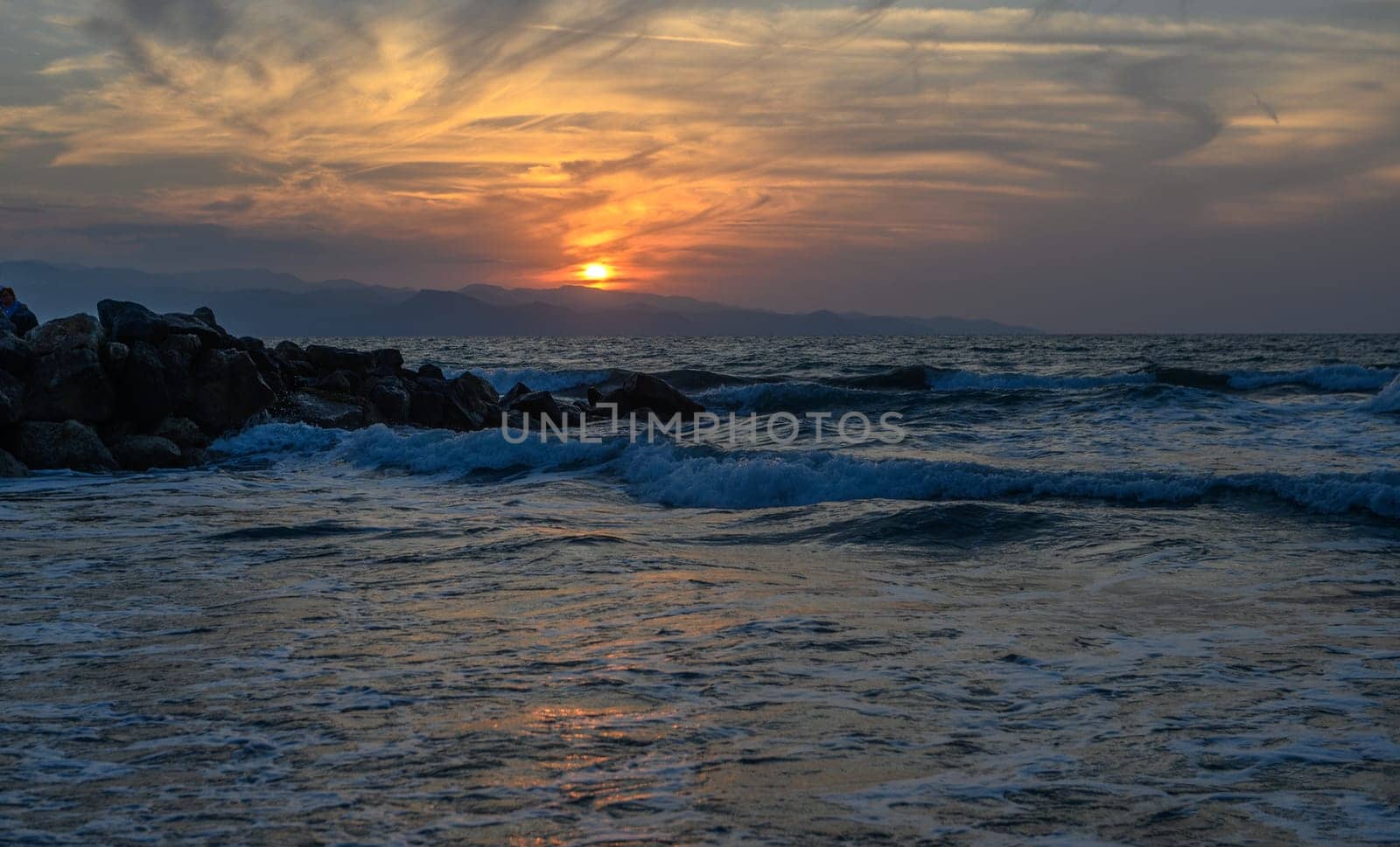 shore of the Mediterranean sea autumn 2023 in the setting sun 12