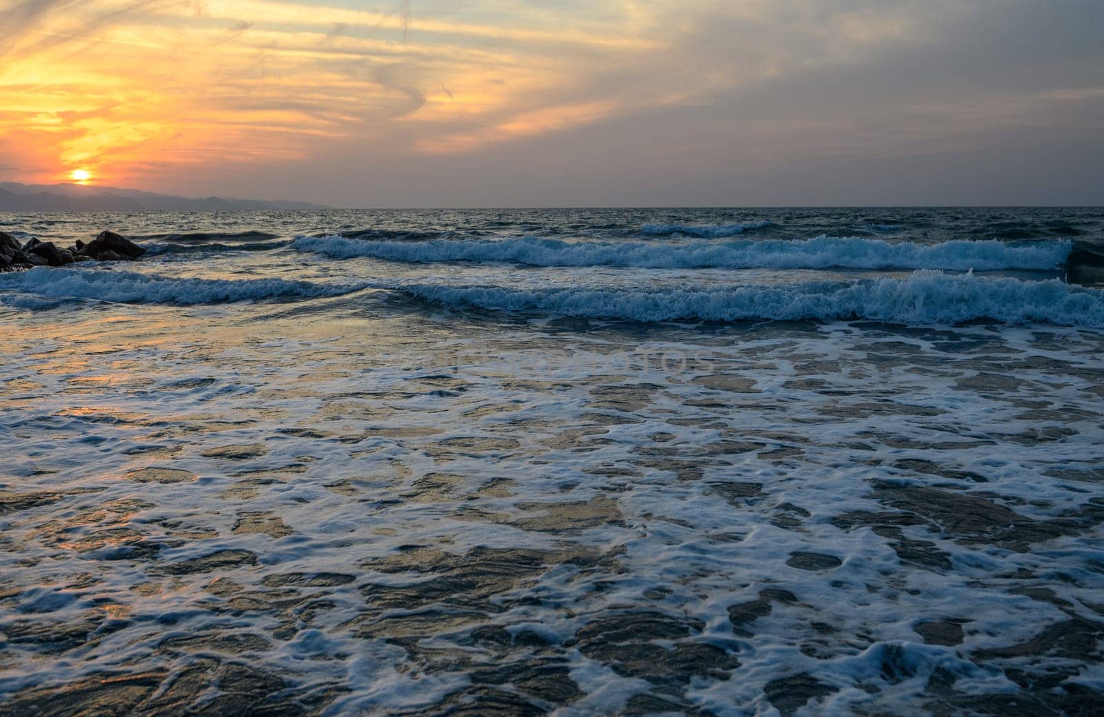 shore of the Mediterranean sea autumn 2023 in the setting sun 14