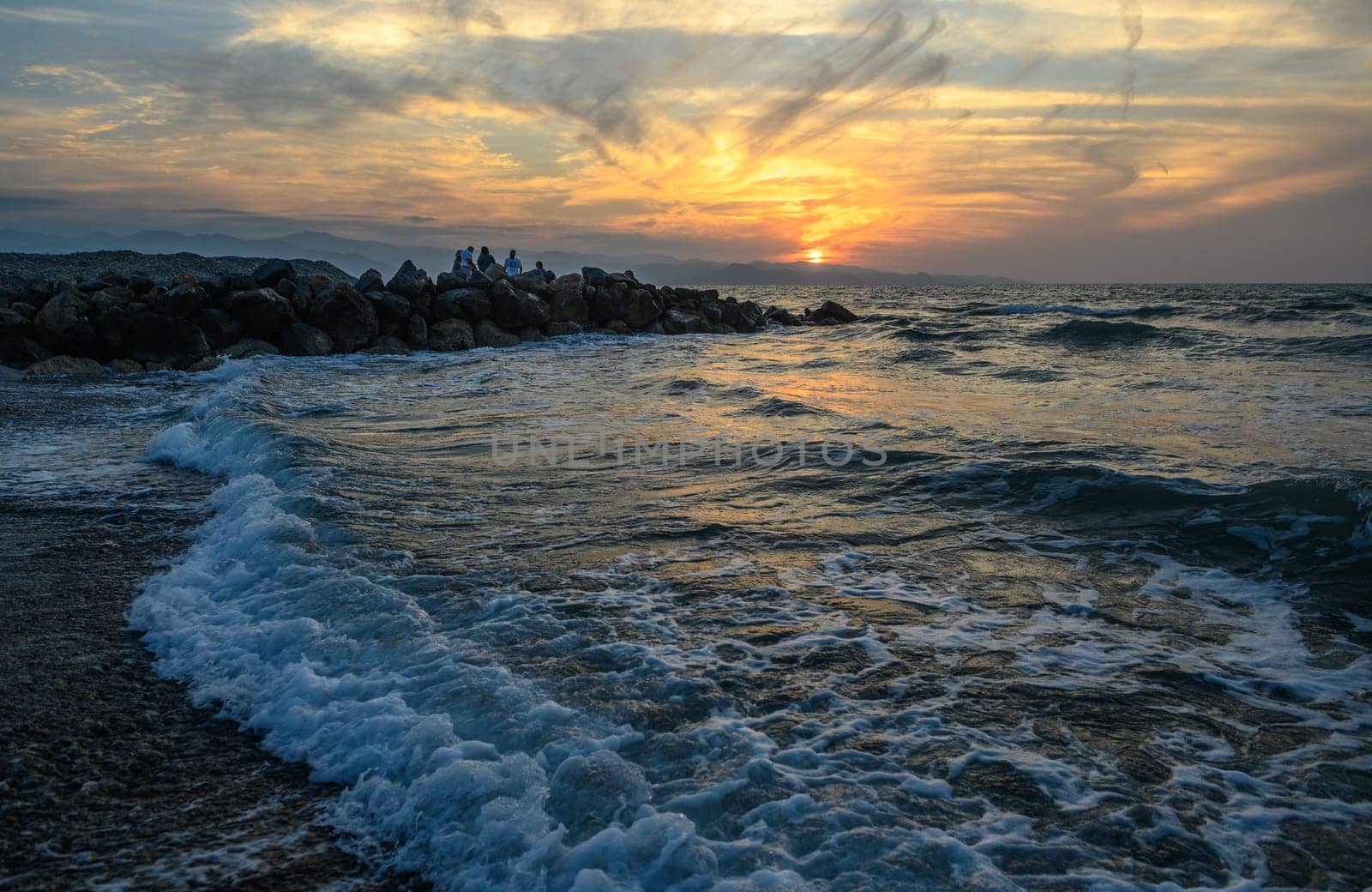 shore of the Mediterranean sea autumn 2023 in the setting sun 17