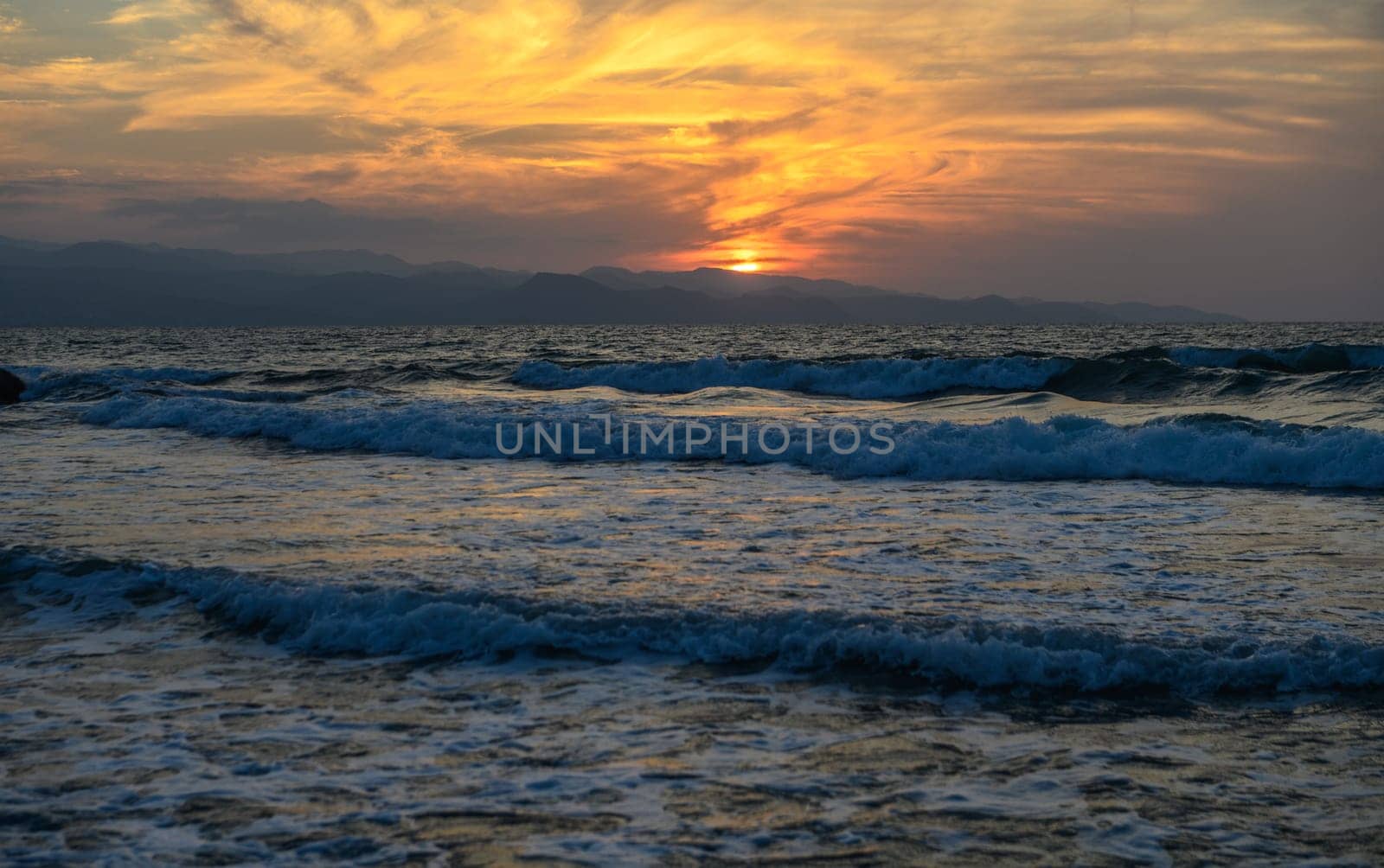 shore of the Mediterranean sea autumn 2023 in the setting sun 18