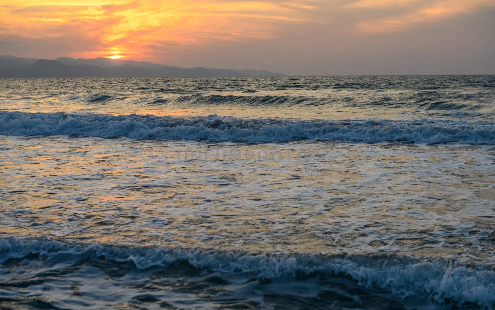 Mediterranean sunset in autumn 2023, beach in the evening 1