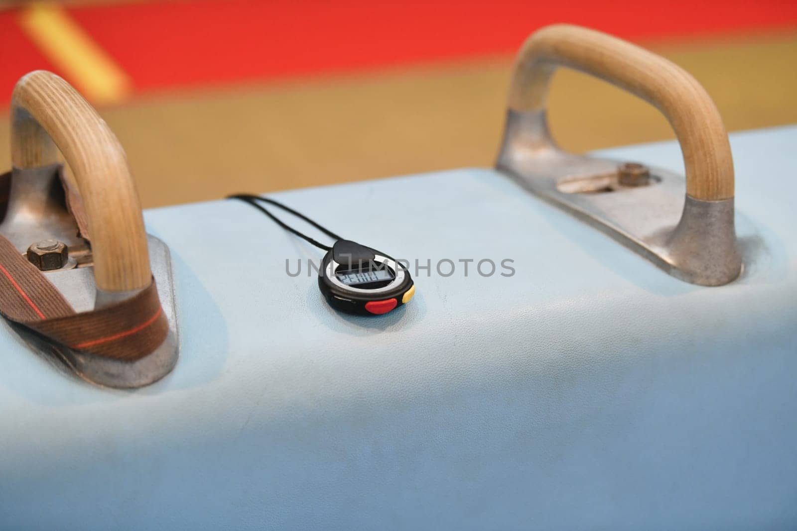 Pommel horse and stopwatch in the gym equipment