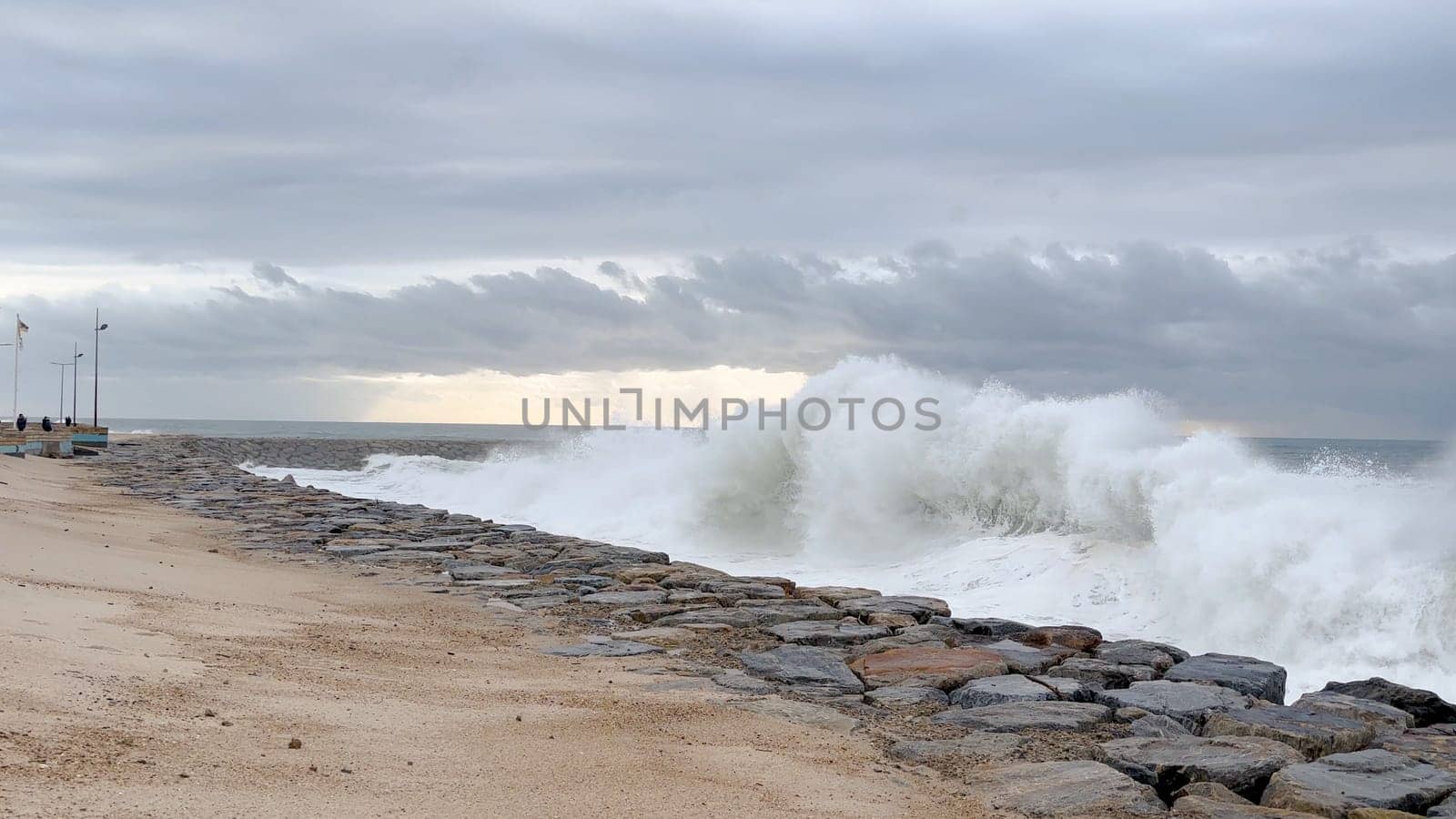 OVAR, PORTUGAL - 31 OCTOBER 2023: The sea rises to the seafront of Furadouro in Ovar. The advance of the sea due to climate change threatens Portugal.