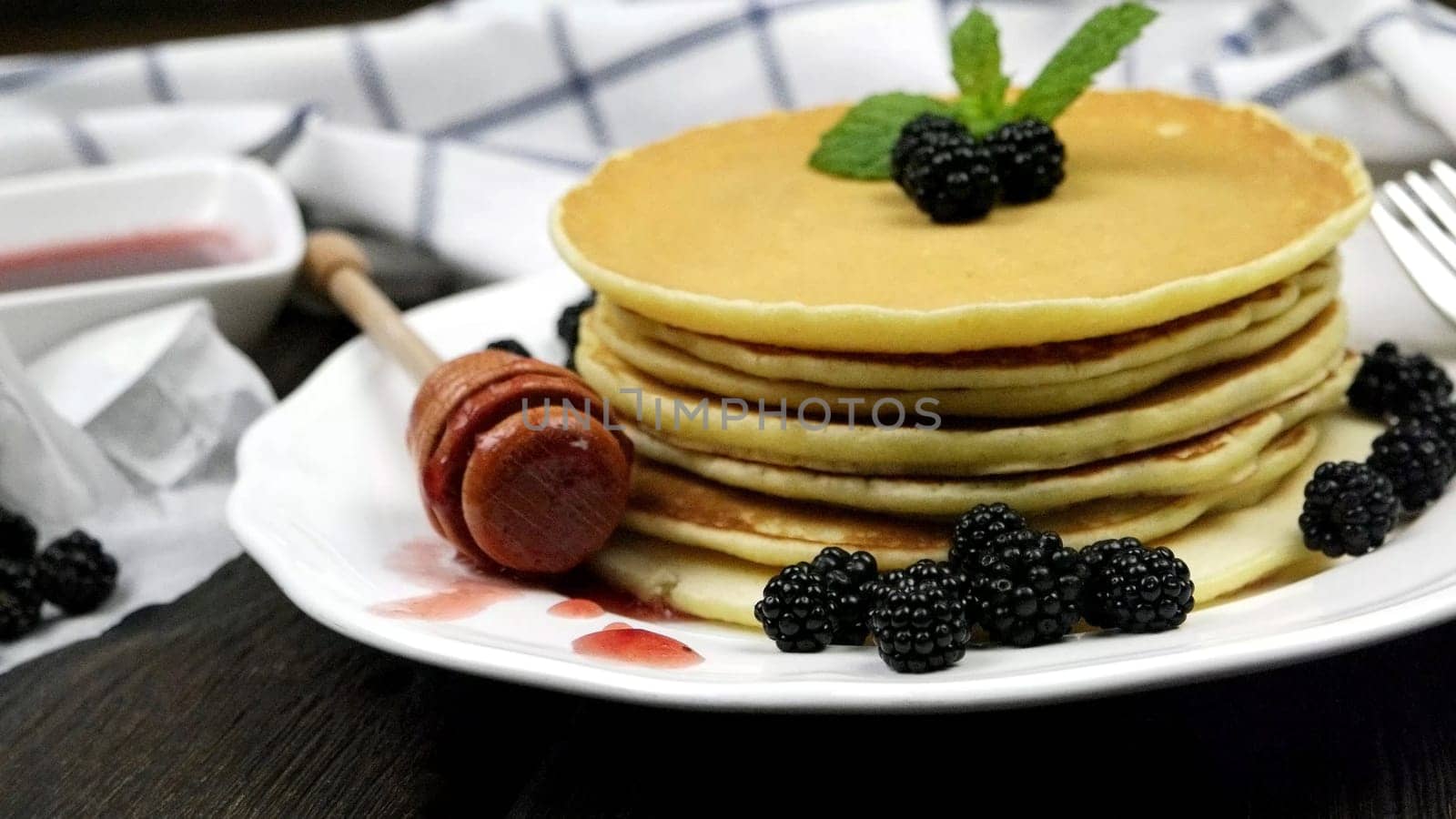 Pancakes with fresh blackberries by homydesign