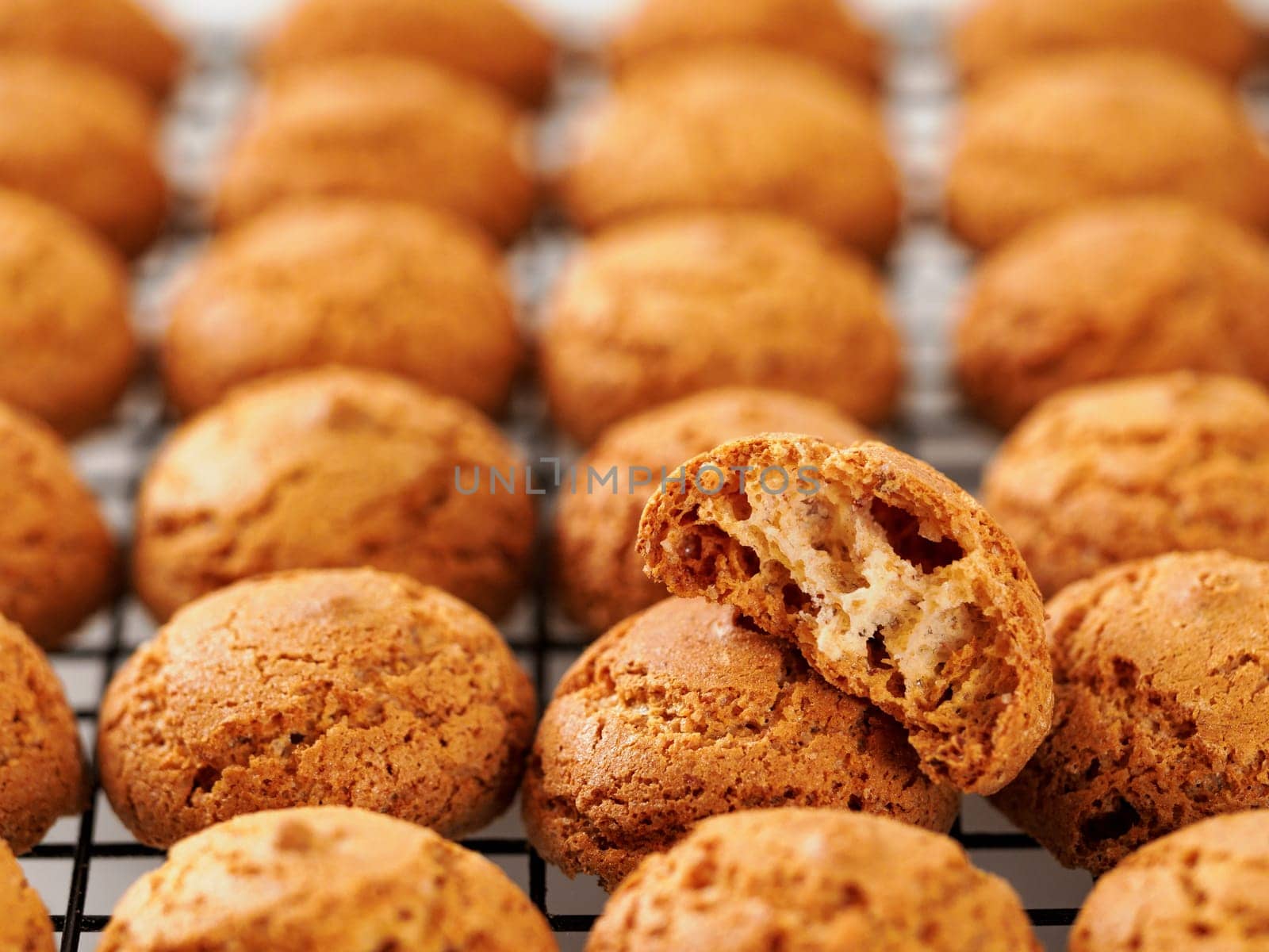Amaretti cookie on cooling rack by fascinadora