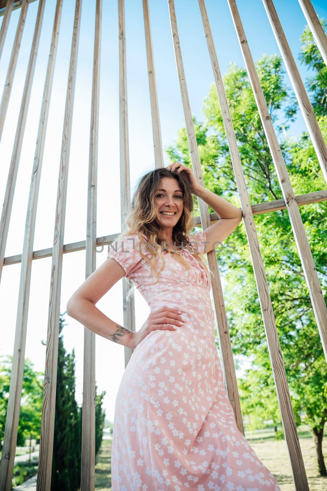 woman near wooden boards walk rest