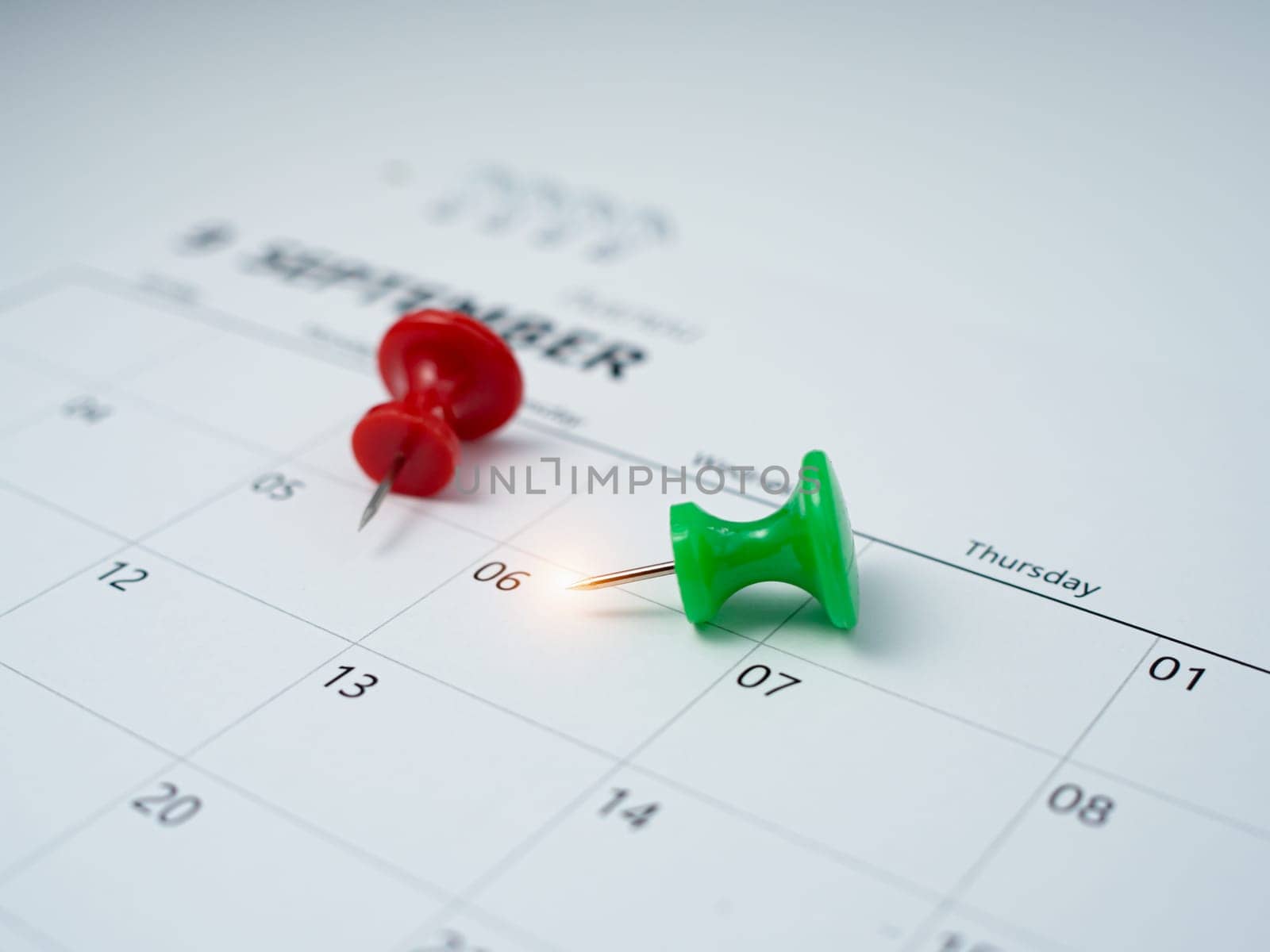 Pinning to the calendar It represents appointments, meeting reminders, planning for business meetings and travel planning concepts. by Unimages2527