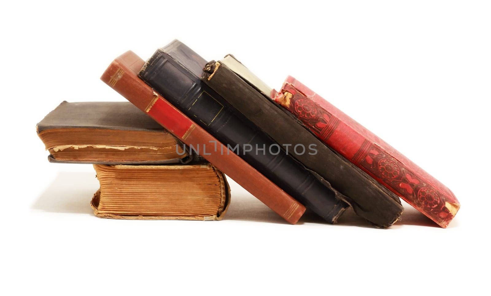 Set of various old books on white background