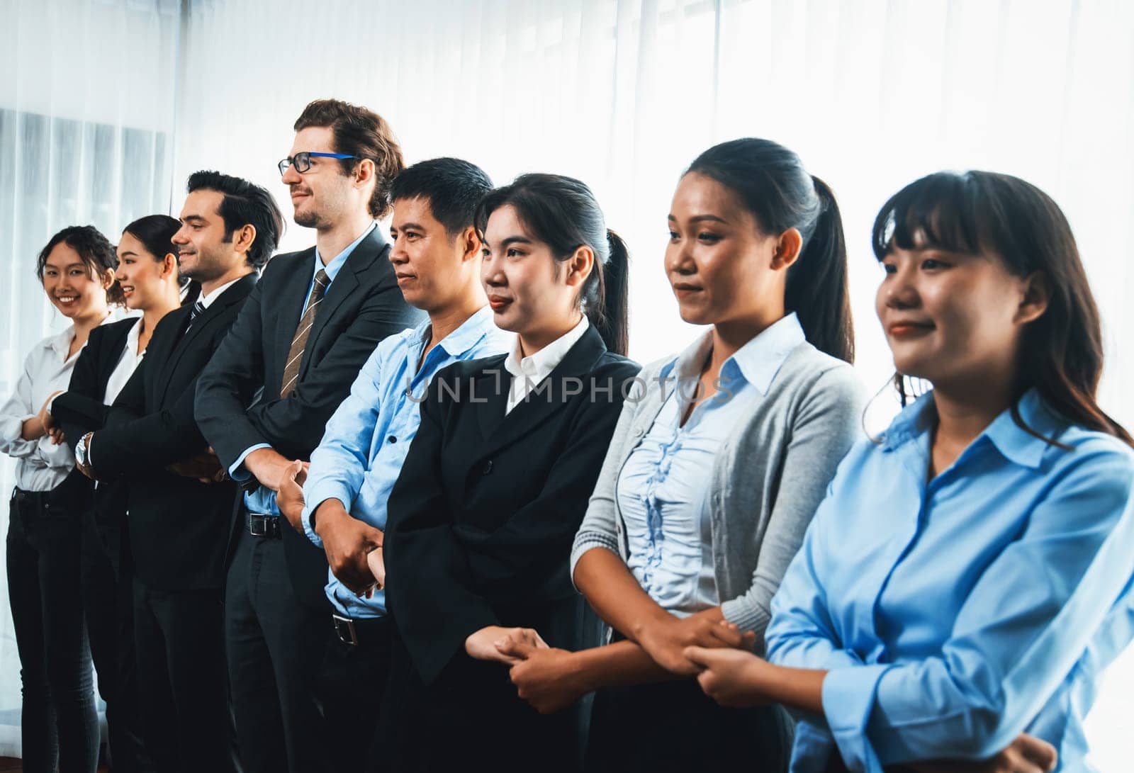 Modern diversity and multicultural company, business people joining hand together and standing in line, shared commitment to collaboration and cooperation concept background. Meticulous