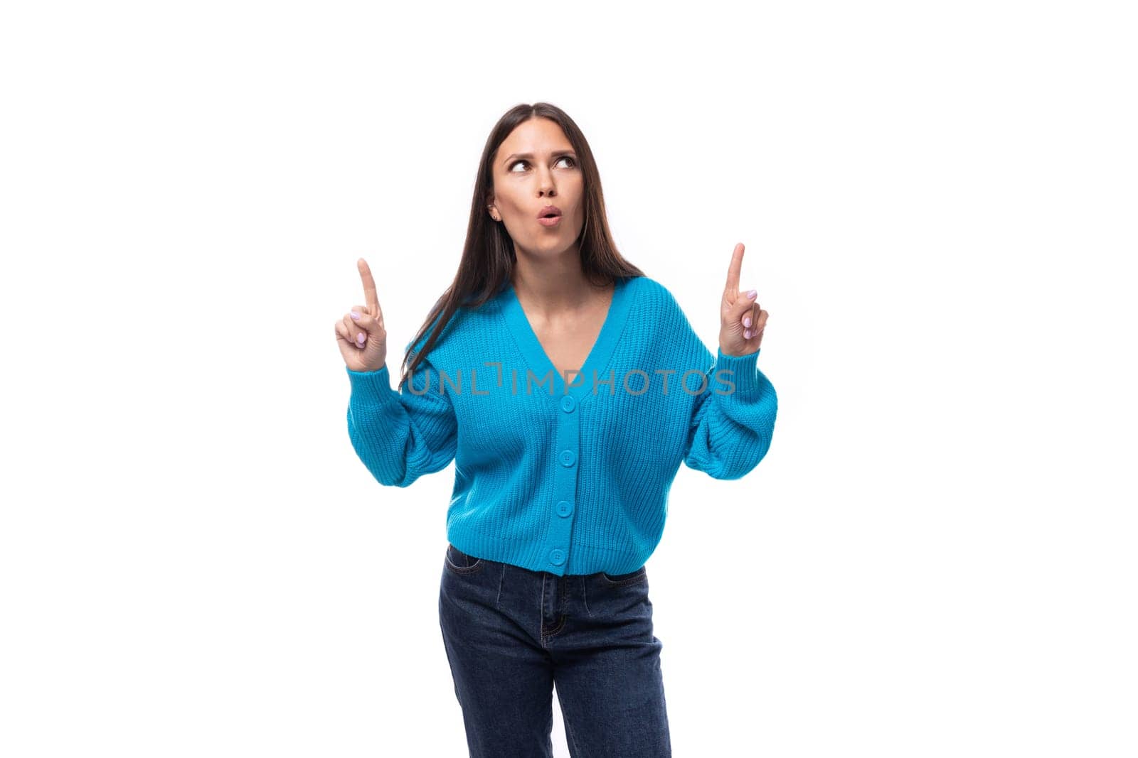 charming caucasian woman with black hair is dressed in a blue sweater on a white background. people lightstyle concept by TRMK