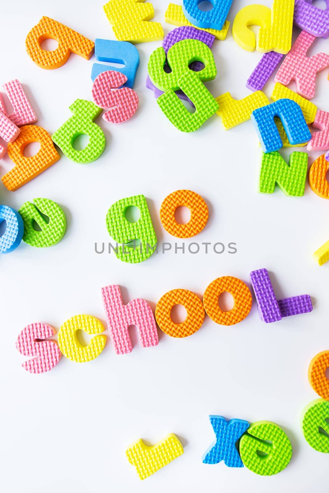 Multicolored letters. Letters for the study of children in kindergarten or school, fluted letters. Go school inscription. by sfinks