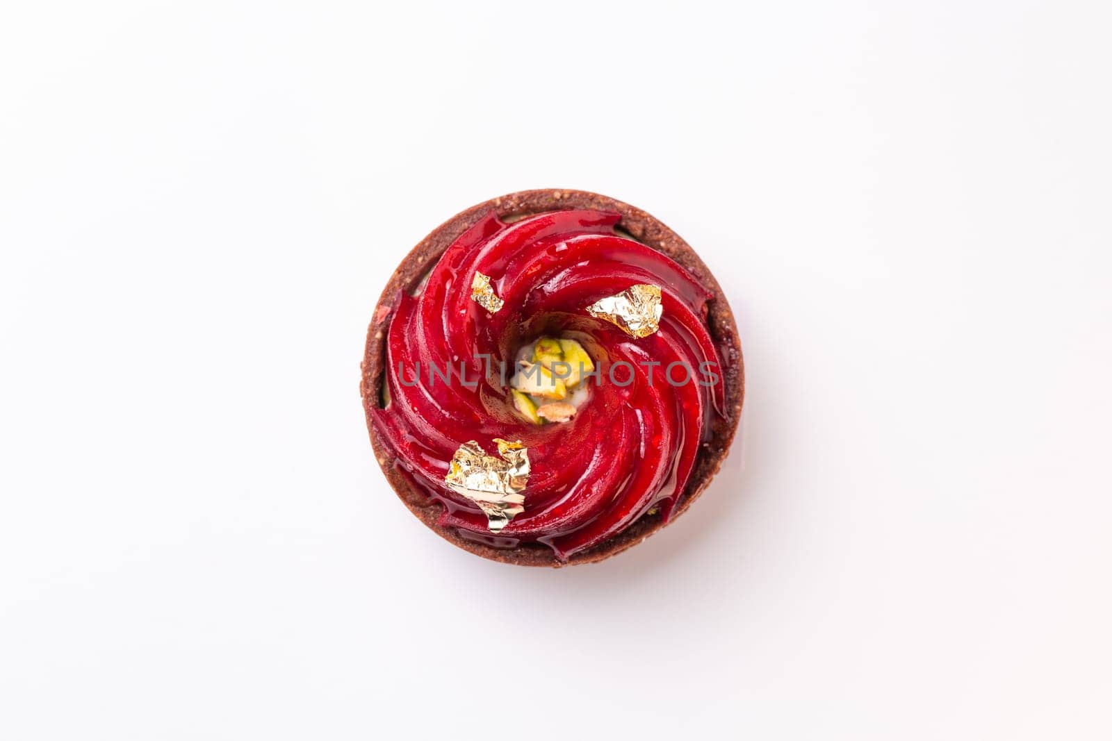 top view sweet dessert tartlet with berry jam by Pukhovskiy