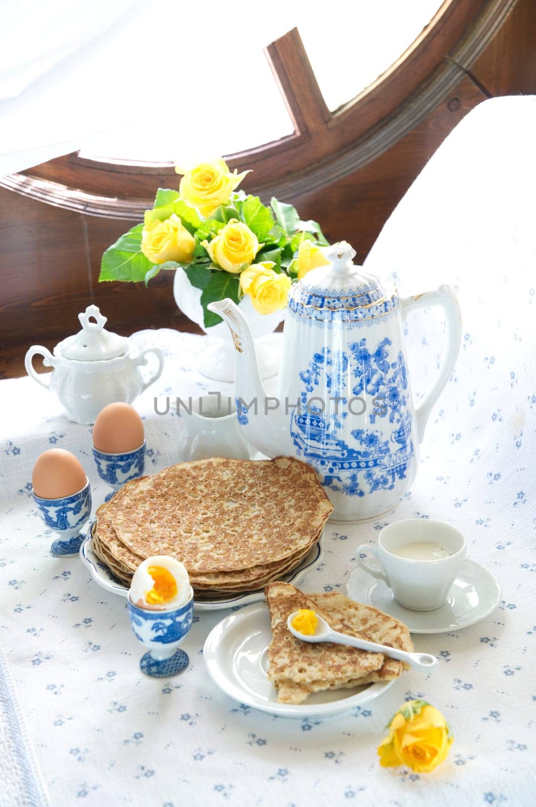 breakfast with pancakes and apple jam for pancake week, spring still life on the window. High quality photo