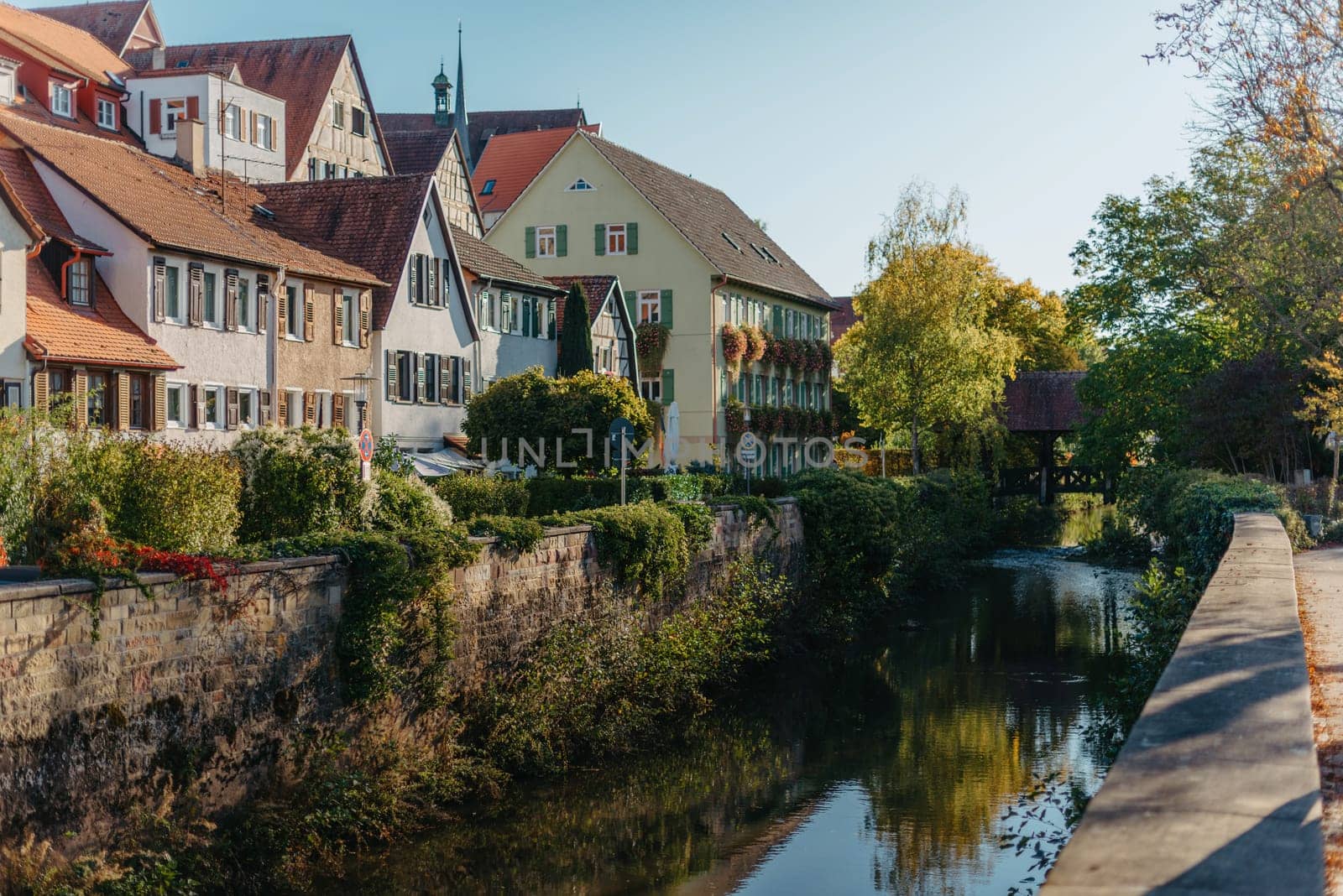 Old national German town house. Old Town is full of colorful and well preserved buildings. Baden-Wurttemberg is a state in southwest Germany bordering France and Switzerland. The Black Forest, known for its evergreen scenery and traditional villages, lies in the mountainous southwest. Stuttgart, the capital, is home to Wilhelma, a royal estate turned zoo and gardens. Porsche and Mercedes-Benz have headquarters and museums there. The 19th-century Hohenzollern Castle sits in the Swabian Alps to the south.