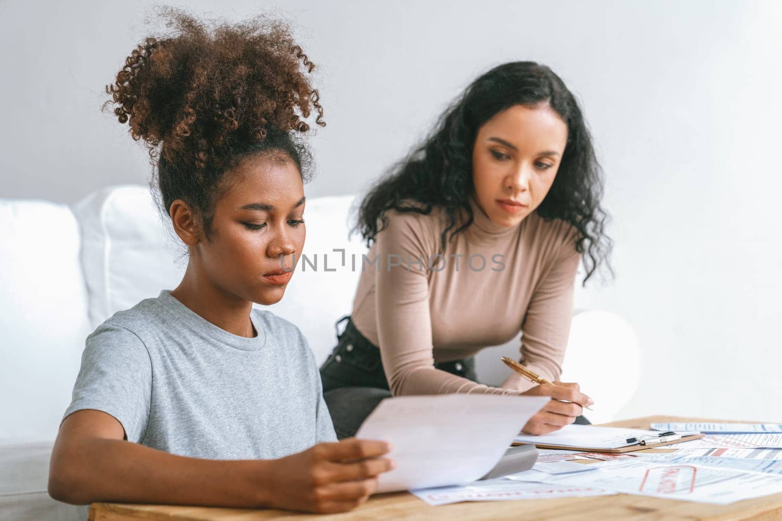 Stressed African American women has financial problems with credit card debt to pay crucial show concept of bad personal money and mortgage pay management crisis.