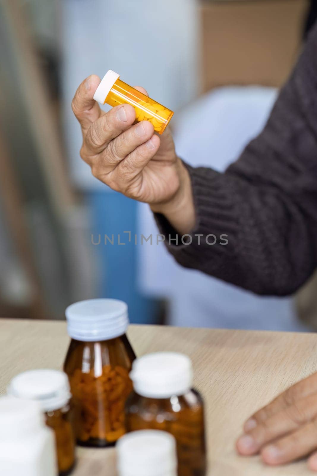 caucasian woman is sitting on prescription medication prescribed by doctor.