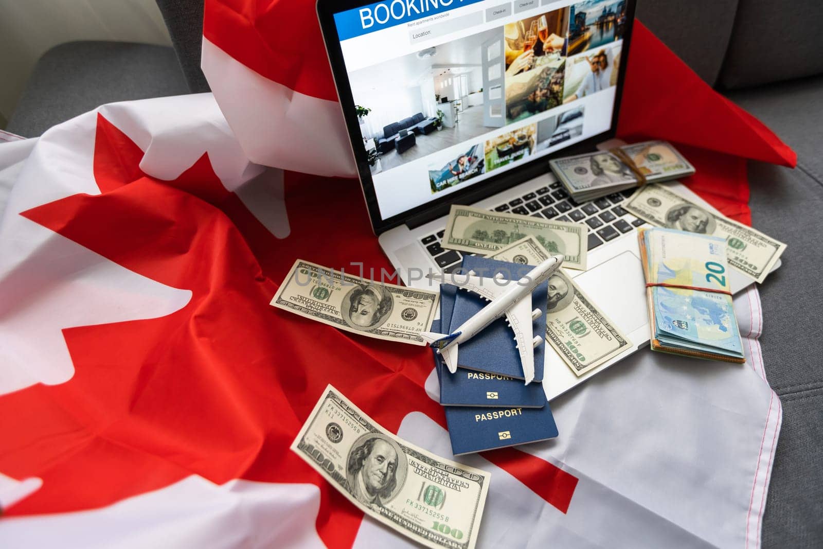travel laptop, money and Canadian flag by Andelov13