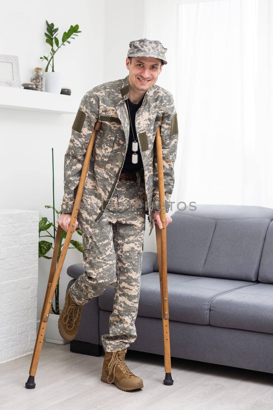 military Wounded Soldier Using Crutch by Andelov13