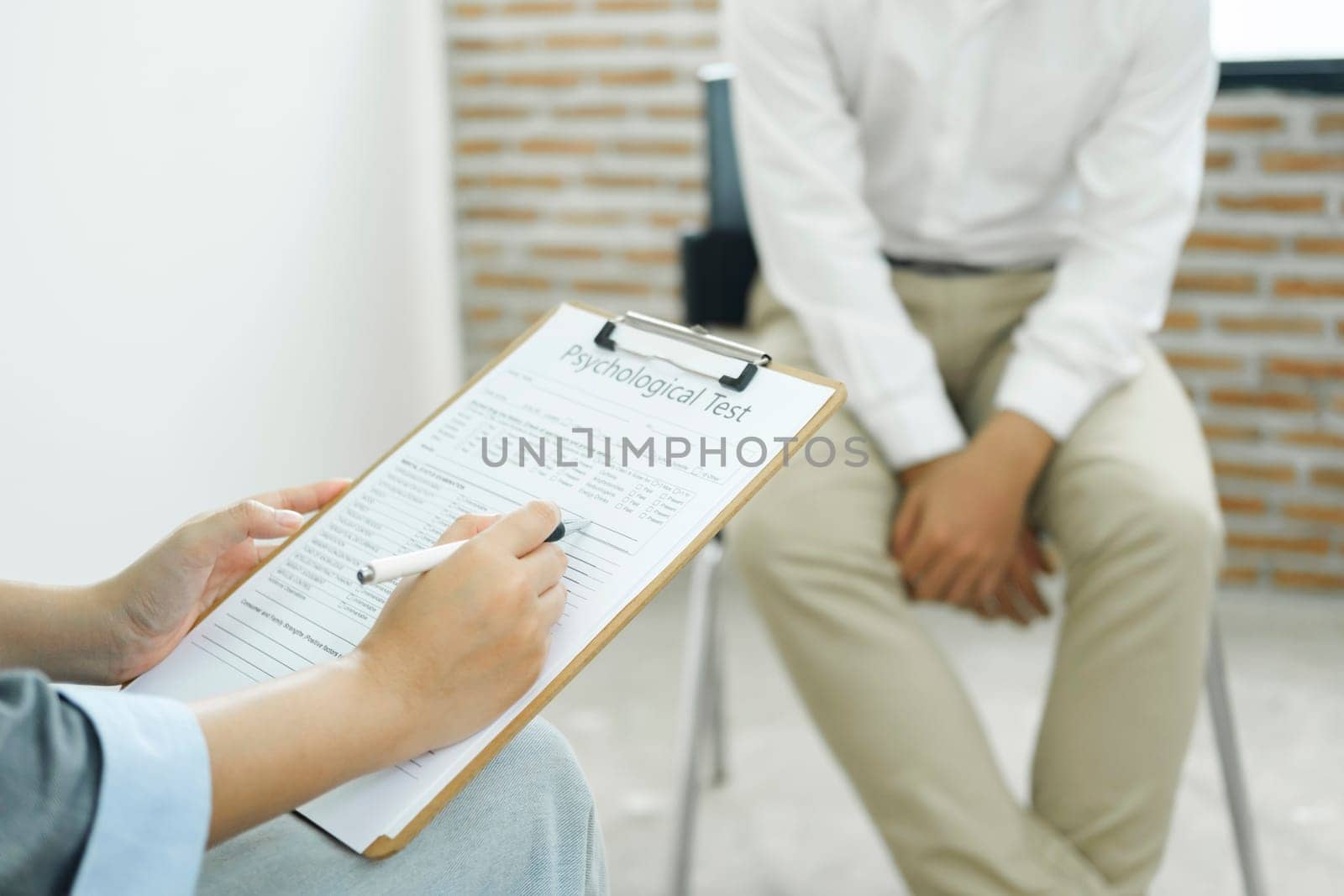 Professional psychologist conducting a consultation by ijeab