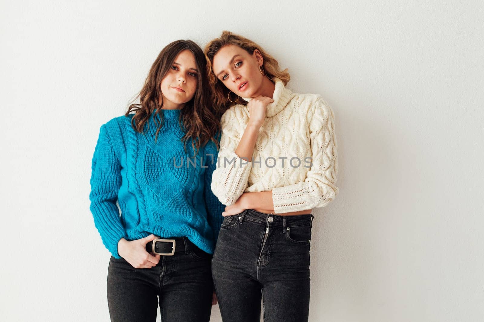 two friends in winter clothes women in sweater