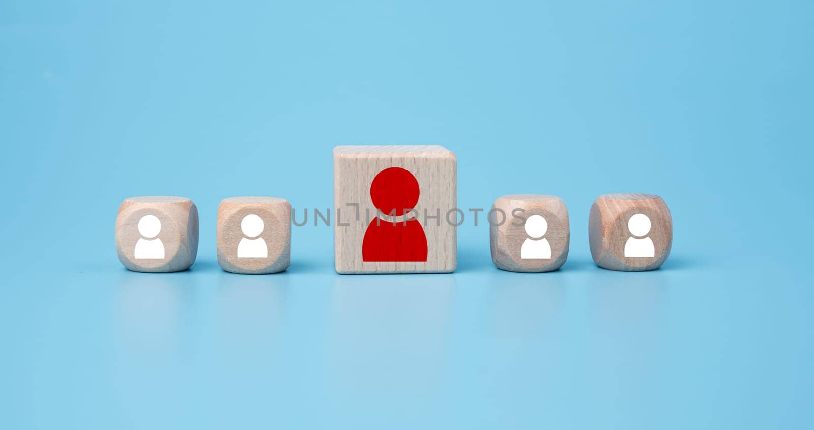 Concept business and HR for leadership and team leader, A wooden block different and stand out from the group. by Unimages2527