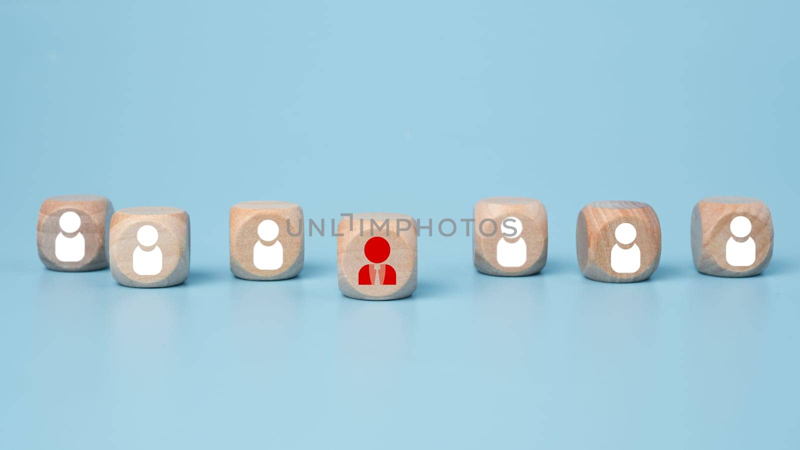 Concept of Business and HR for leadership and team leader. One cube wood out in front  Different and stand out from the group by Unimages2527