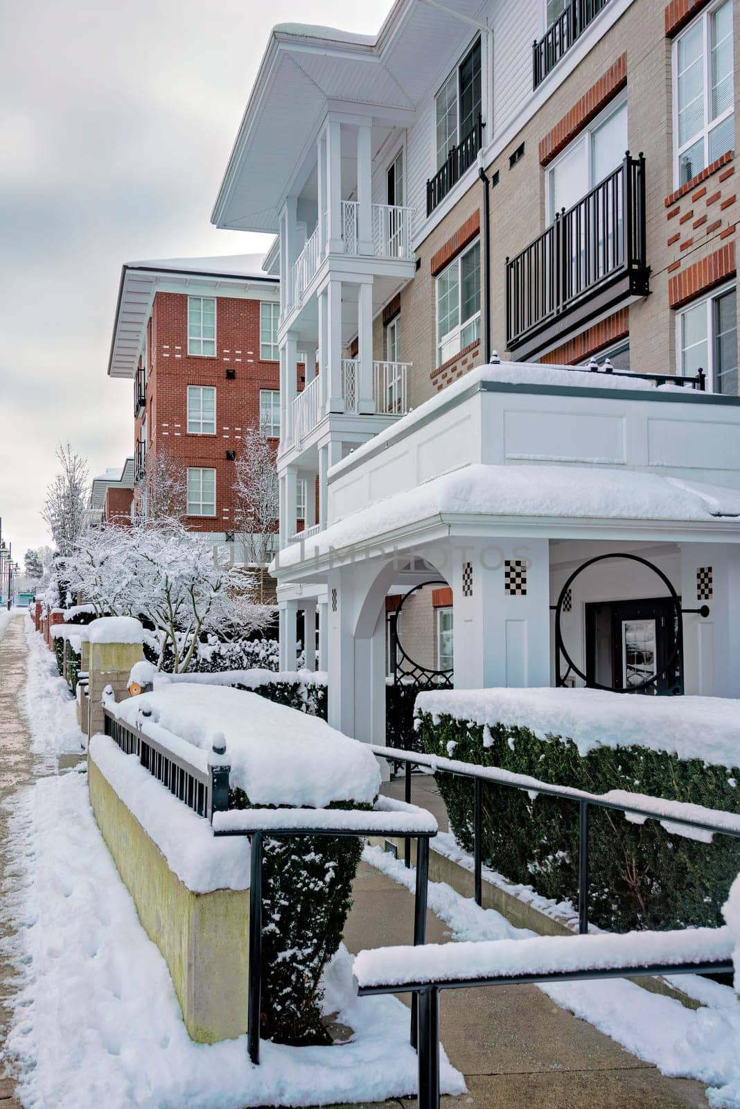 Low-rise residential building with easy access in snow on winter season in Vancouver, Canada.