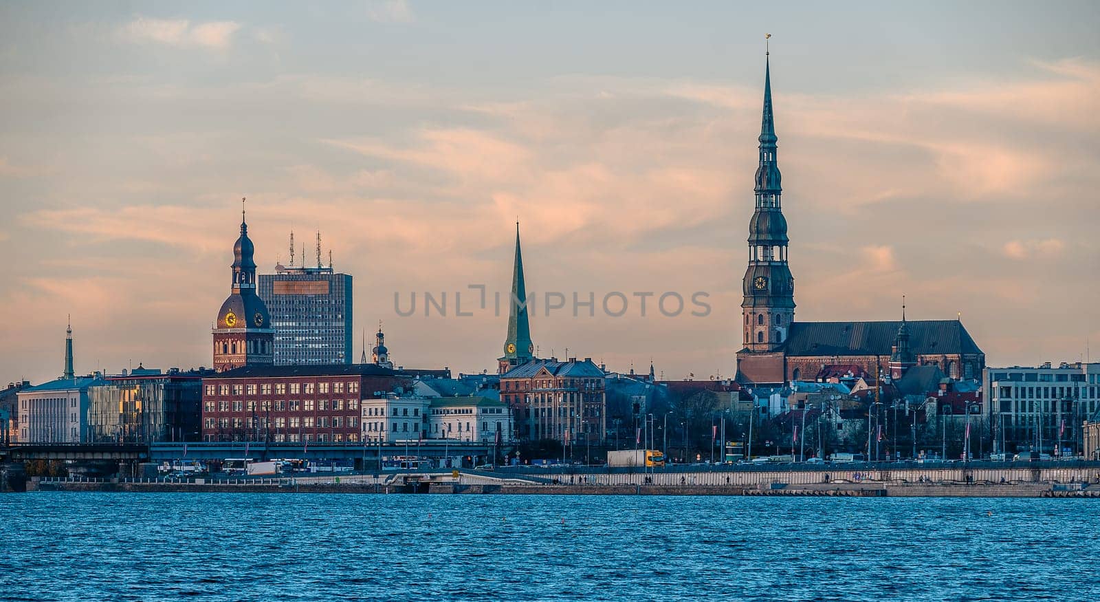 evening view across the Daugava river to Old Riga by Mixa74