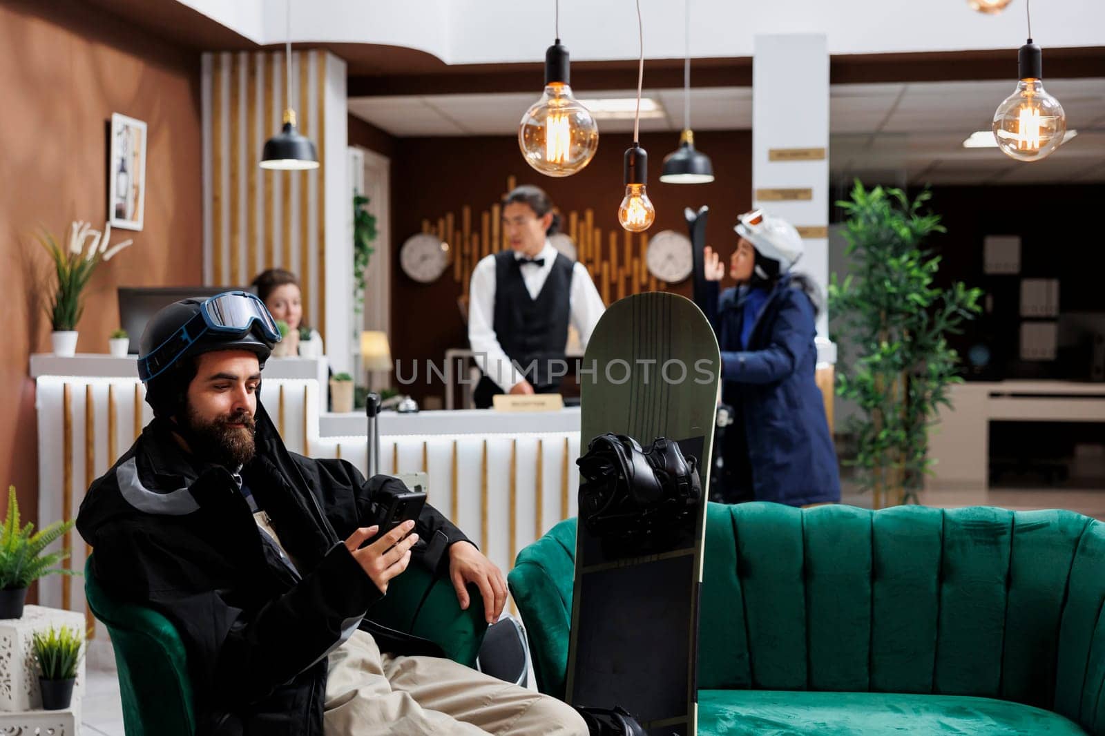 Caucasian guest checks hotel reservation by DCStudio