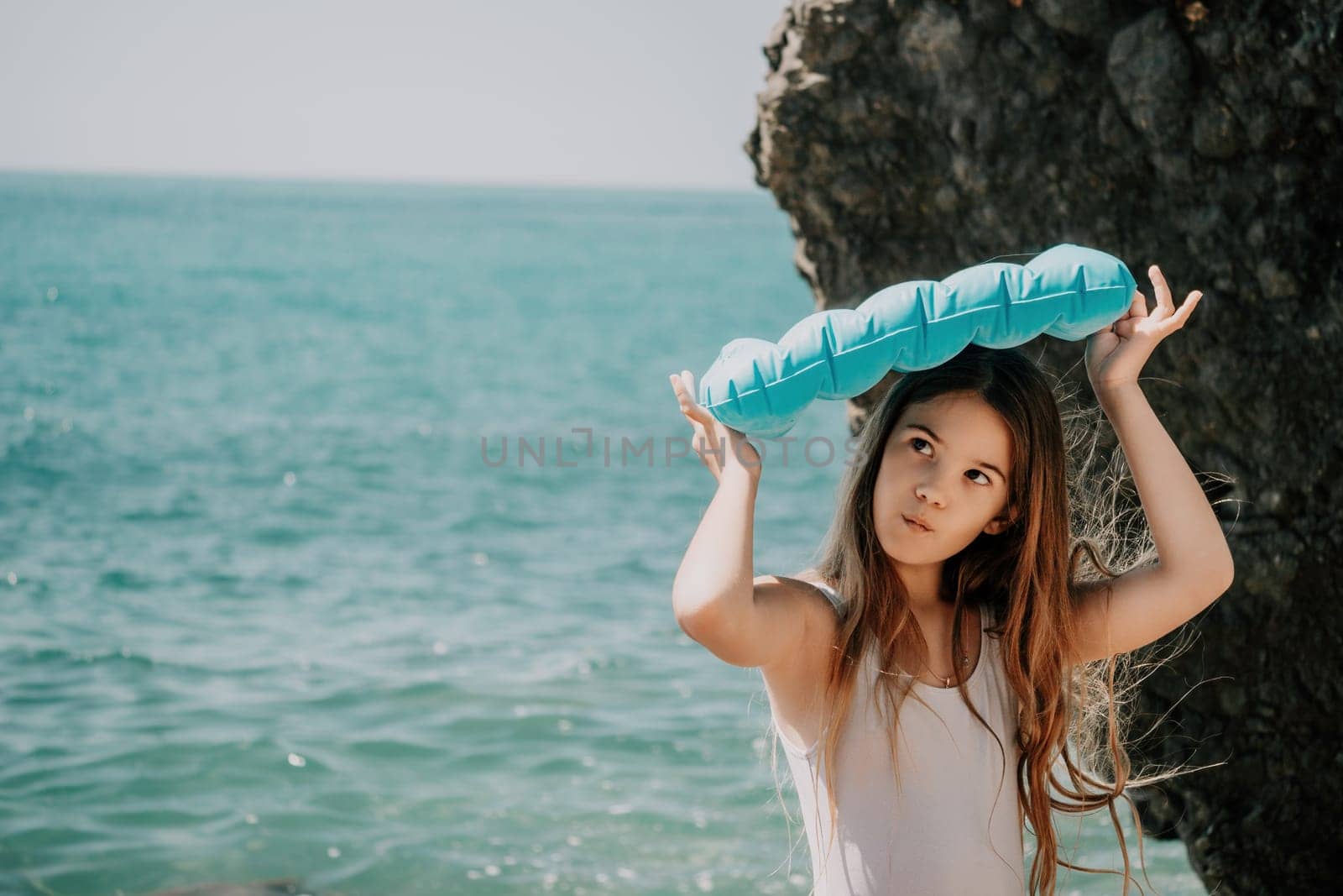 Silhouette mother and daughter doing yoga at beach. Woman on yoga mat in beach meditation, mental health training or mind wellness by ocean, sea