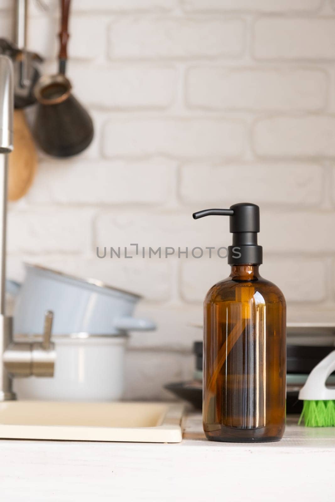 Recycled plastic pump bottle for mock-up. Minimalism brand packaging mockup design on white brick wall background