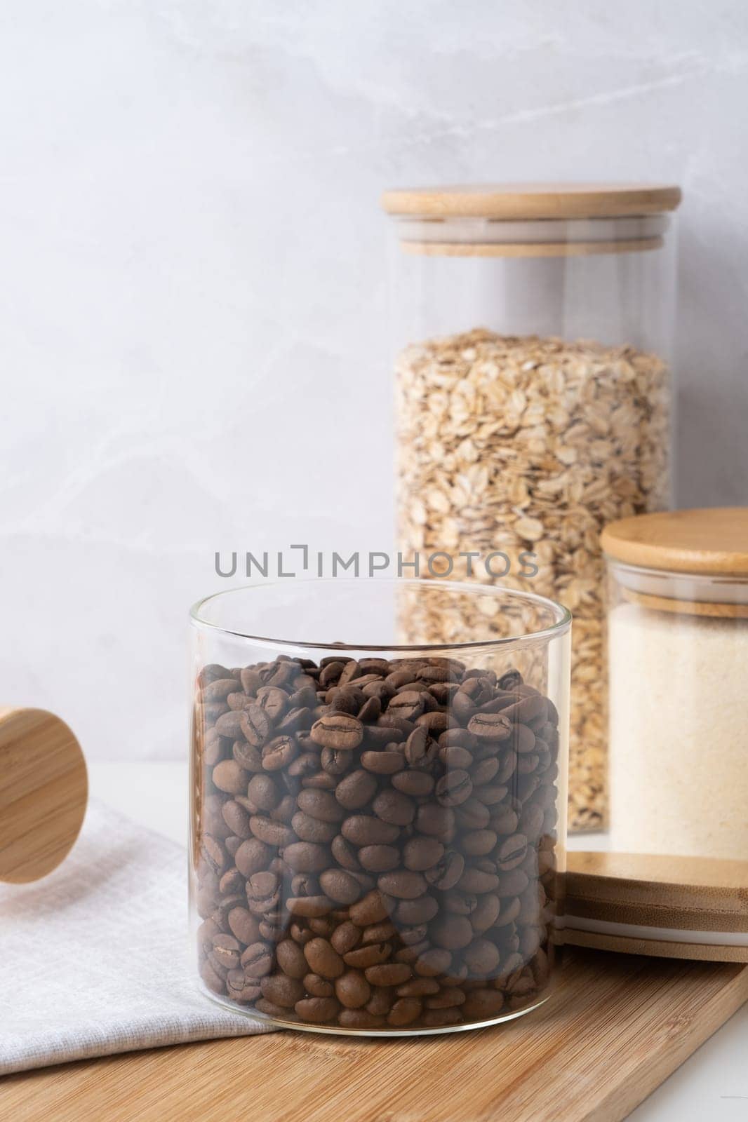 Reusing Glass Jars To Store Dried Food Living Sustainable Lifestyle At Home. coffee beans in glass jar by Desperada