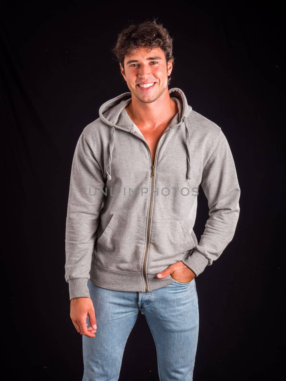 Photo of a man in a gray hoodie posing for a picture by artofphoto