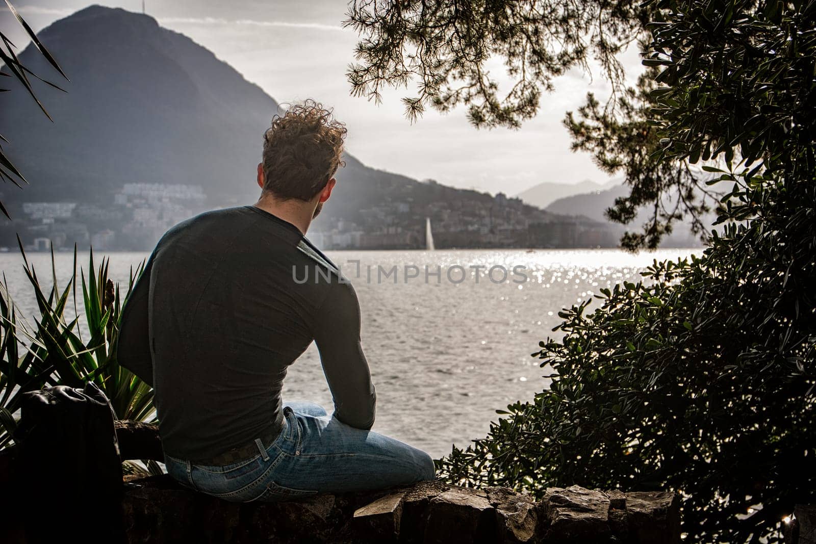 A Serene Moment: A Handsome Man Contemplating the Vastness of Nature's Beauty by artofphoto