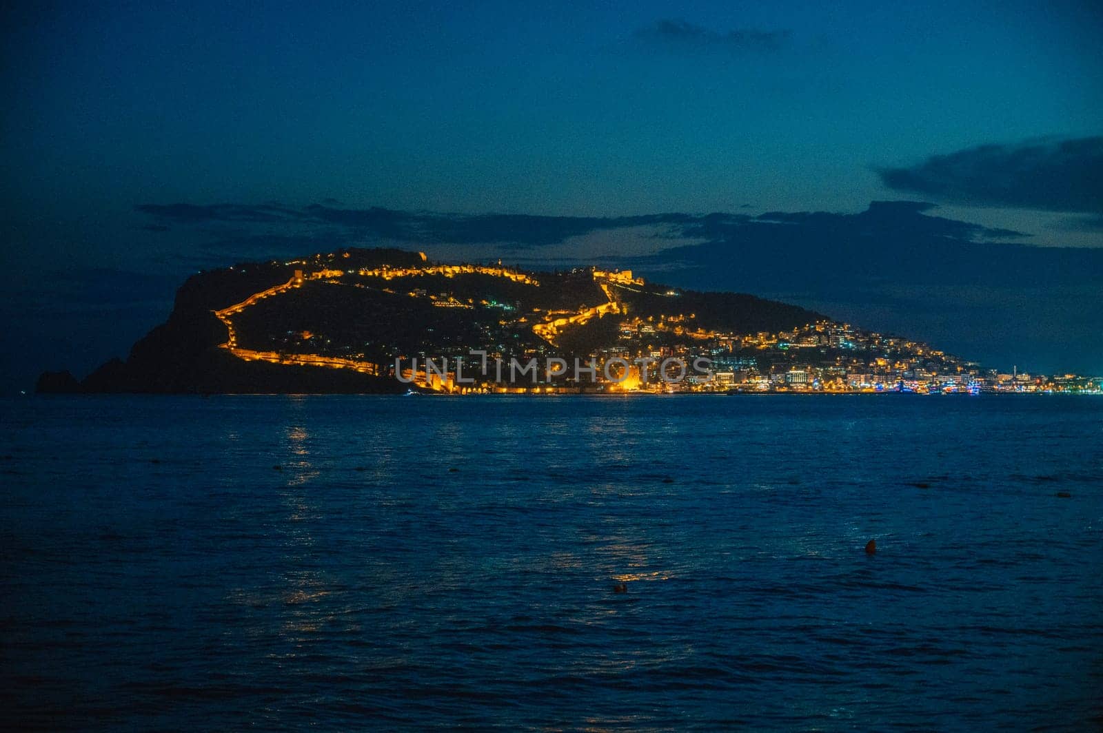 Beautiful night scene on Alanya beach in Turkey