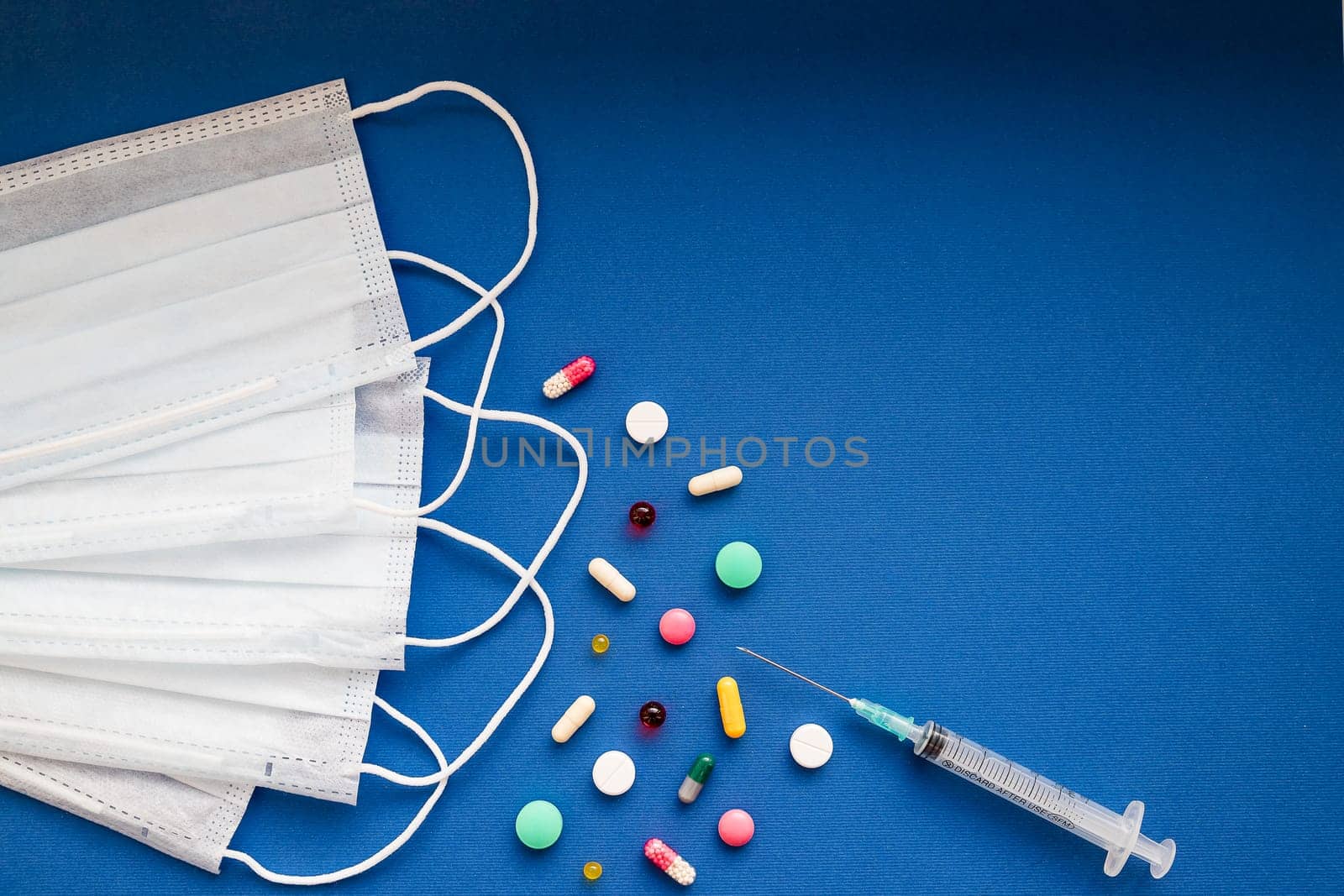 Coronavirus in China. the new coronavirus 2019-nCoV , pills and white medical mask.