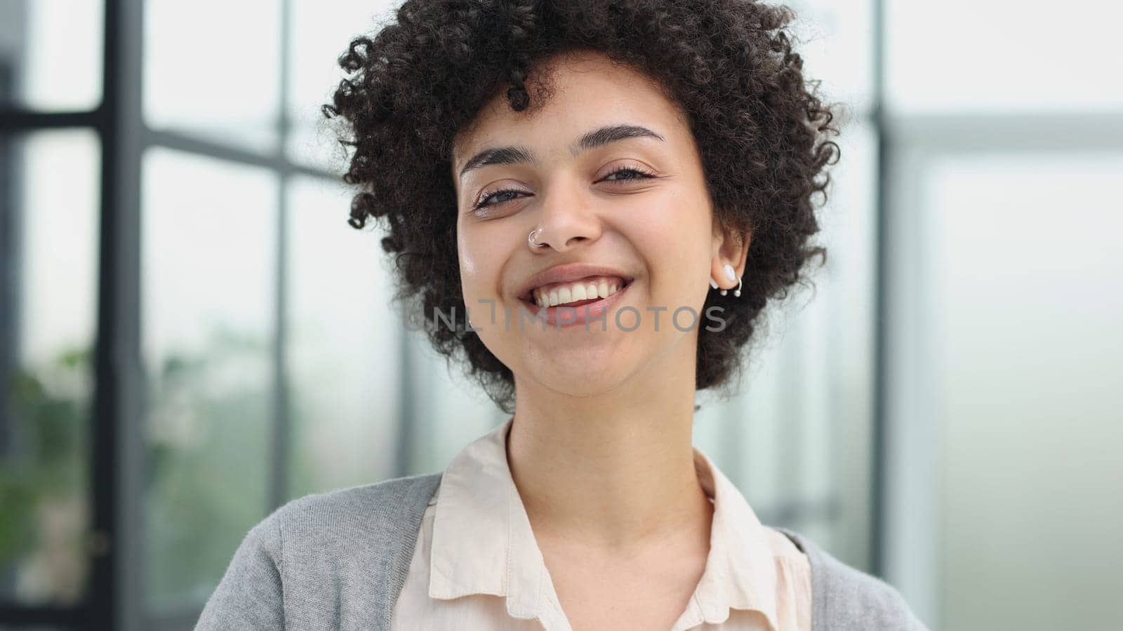 girl in the office smiles expresses success and leadership is thinking about success by Prosto