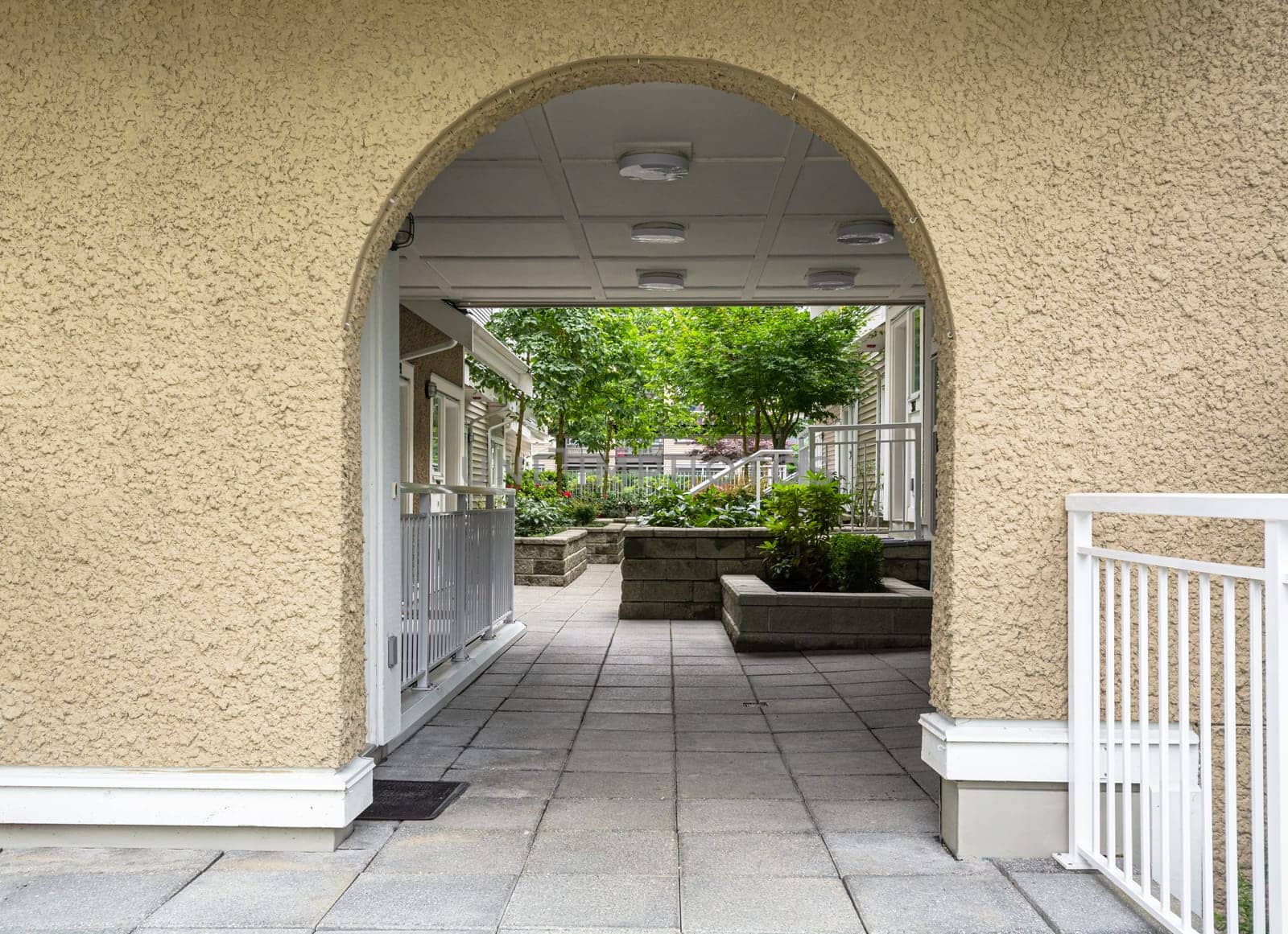 Entrance arch to inner yard of residential complex