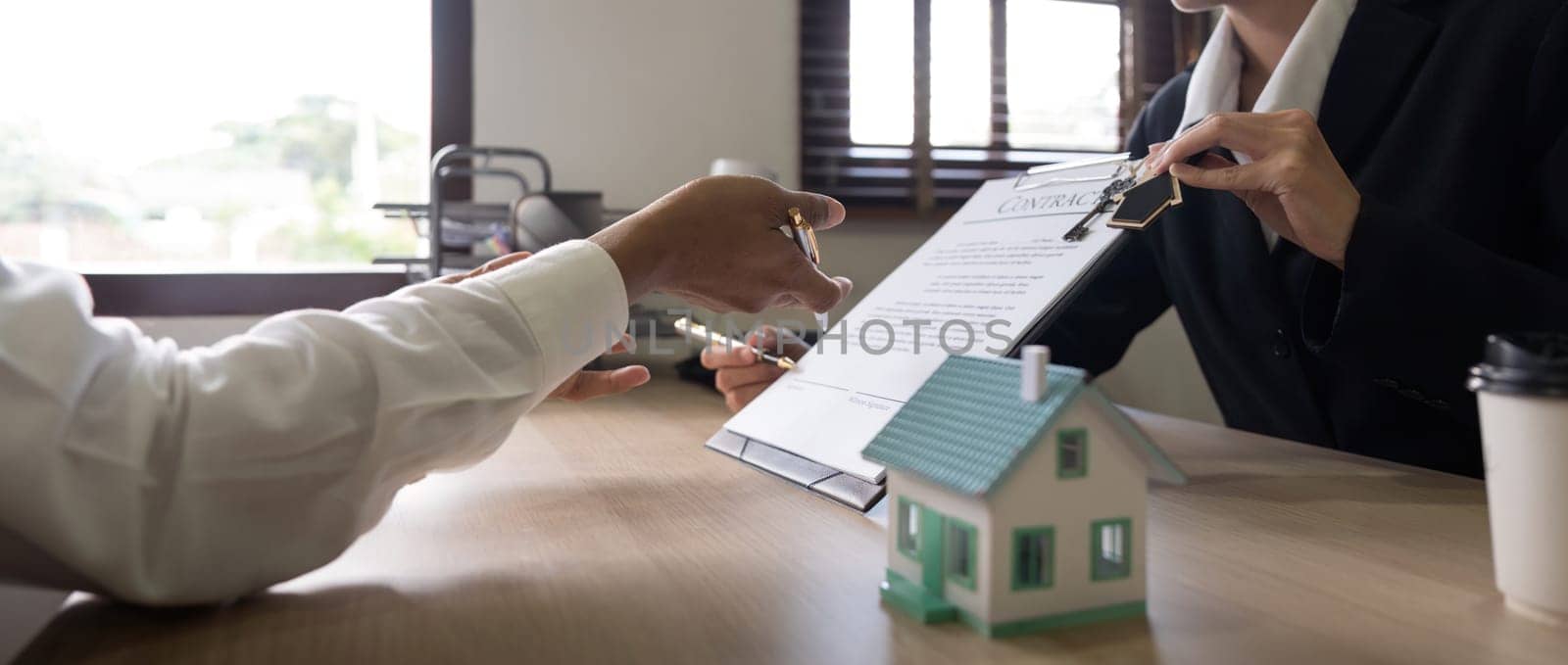 Client meet and negotiate with real estate agent about rent, buy home, talk about the terms of the home purchase agreement and asked customer to signs contract.