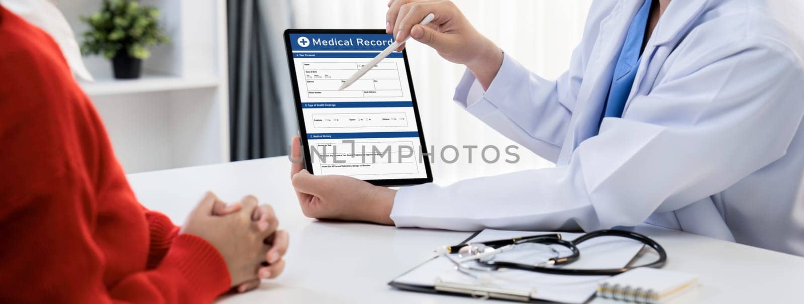 Laptop display medical report or diagnostic result of patient health on blurred background of doctor's appointment in hospital. Medical consultation and healthcare treatment. Panorama Rigid