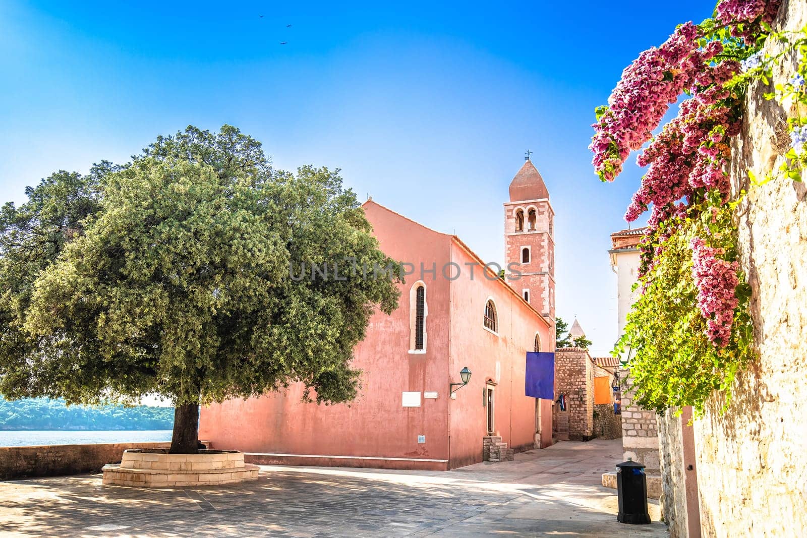 Historic town of Rab Freedom square and church view by xbrchx