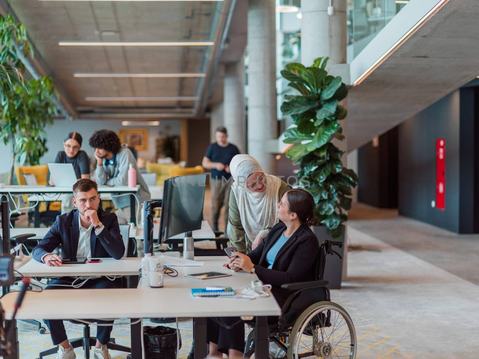 In a modern startup office, a diverse group of young professionals collaboratively tackles various business problems and challenges, surrounded by their engaged colleagues, fostering innovation and productivity.