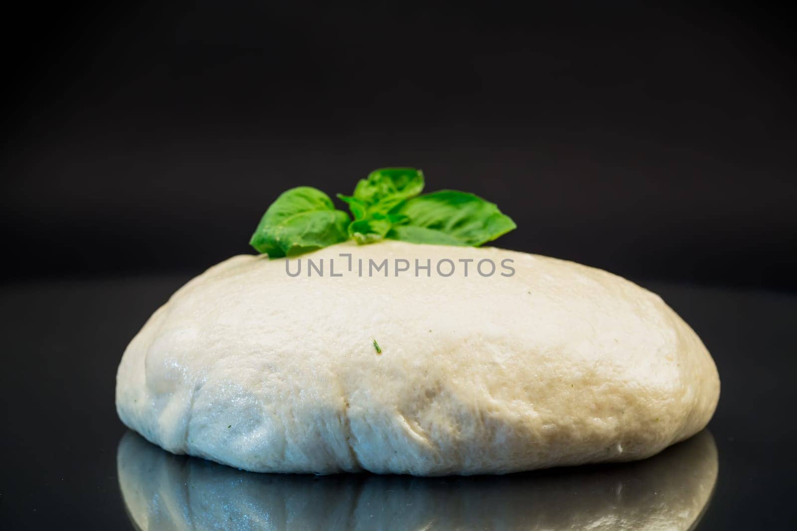 homemade yeast soft dough, isolated on black background
