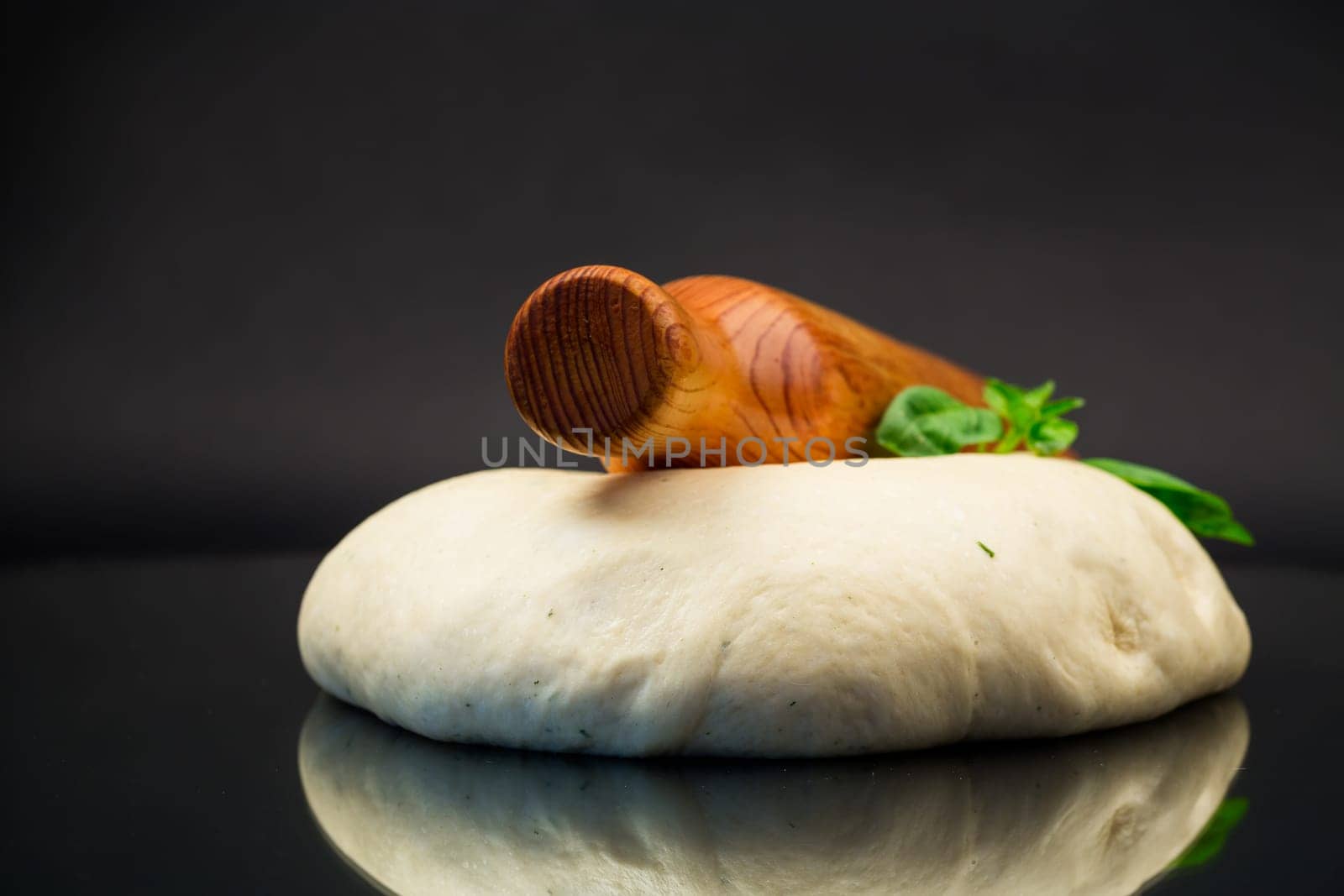 homemade yeast soft dough, isolated on black background