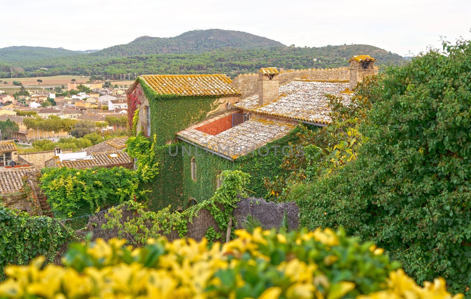 Spain. Costa Brava. Catalonia. Old village in Spain. Picturesque rooftops of the old city. Typical village with beautiful stone houses. by aprilphoto