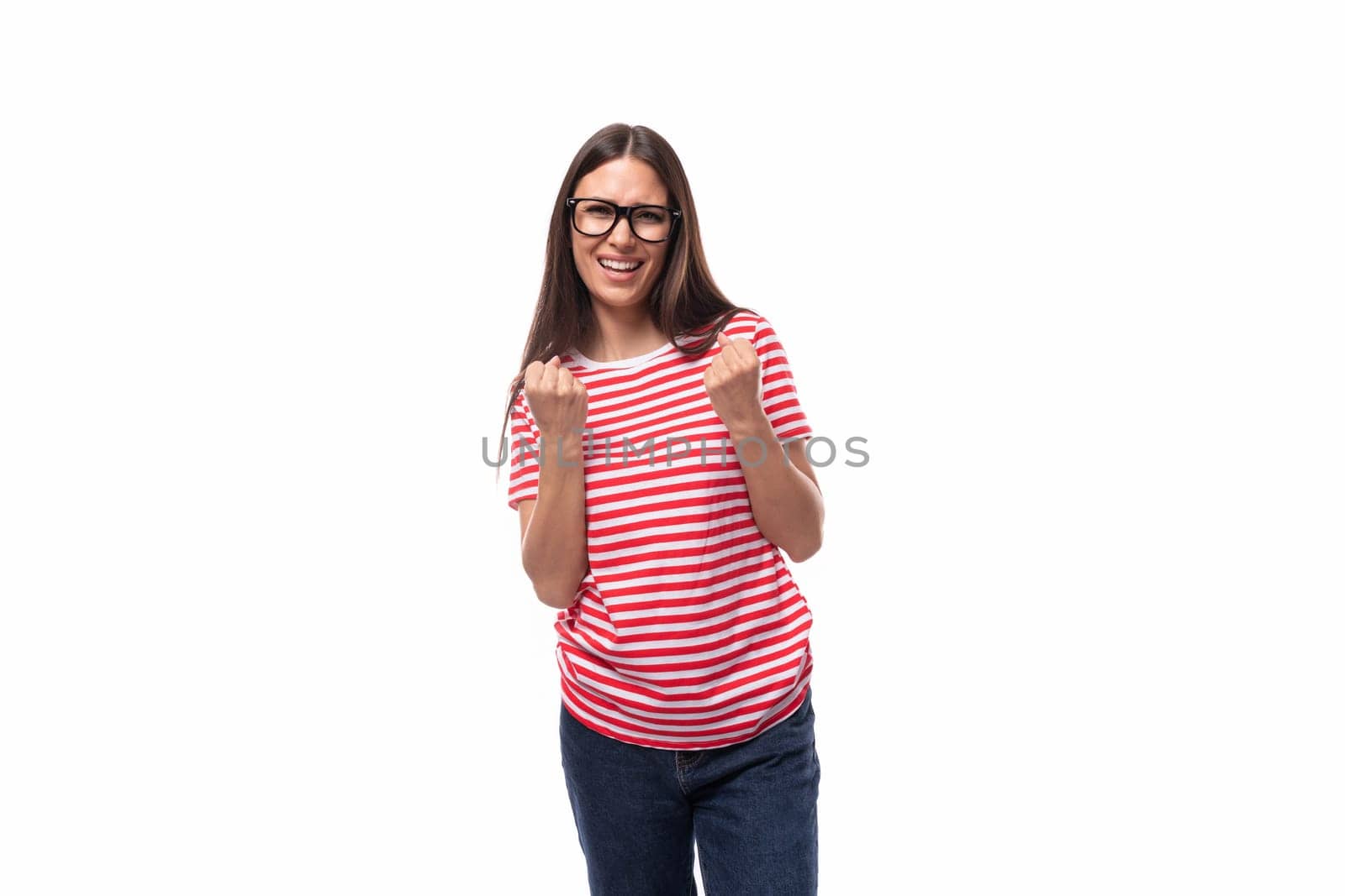 beautiful happy young caucasian woman with straight hair with glasses and in a striped t-shirt.