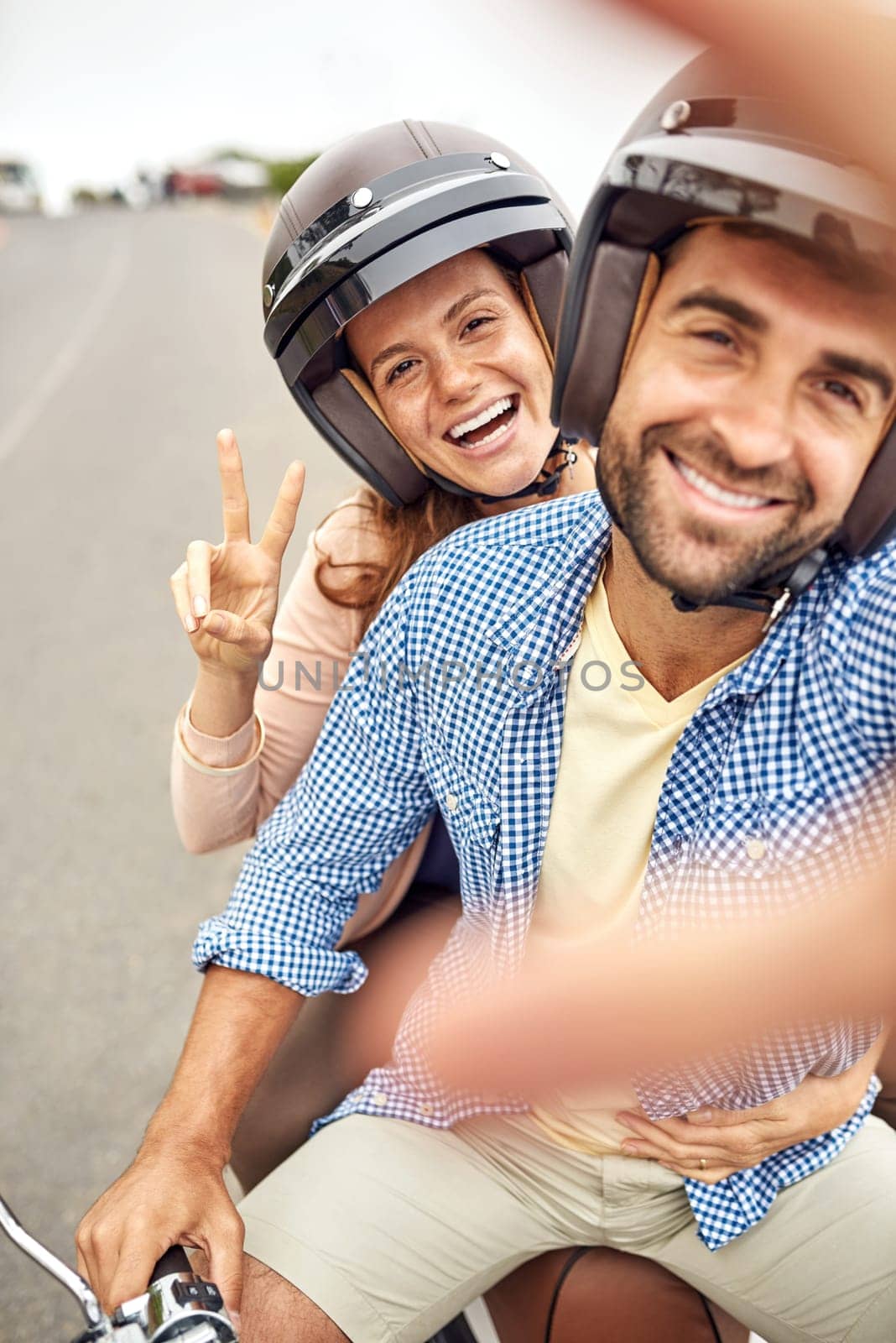 Couple, peace sign and smile in selfie, hand and road trip or vacation, scooter and embrace in portrait. Happy people, freedom and emoji or icon in outdoors, travel and face or tourism with helmet.